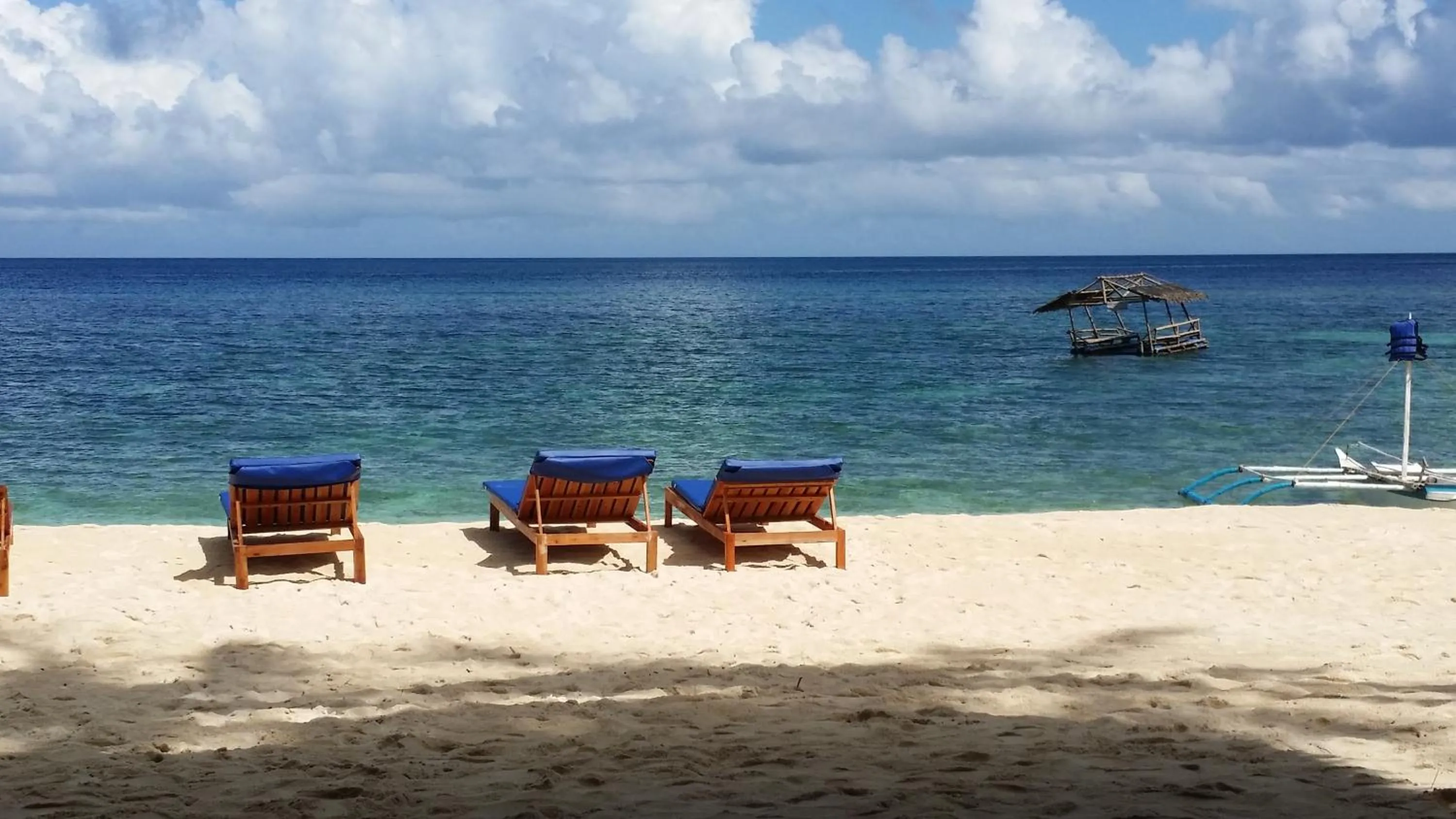 Beach in White Beach Front and Cottages