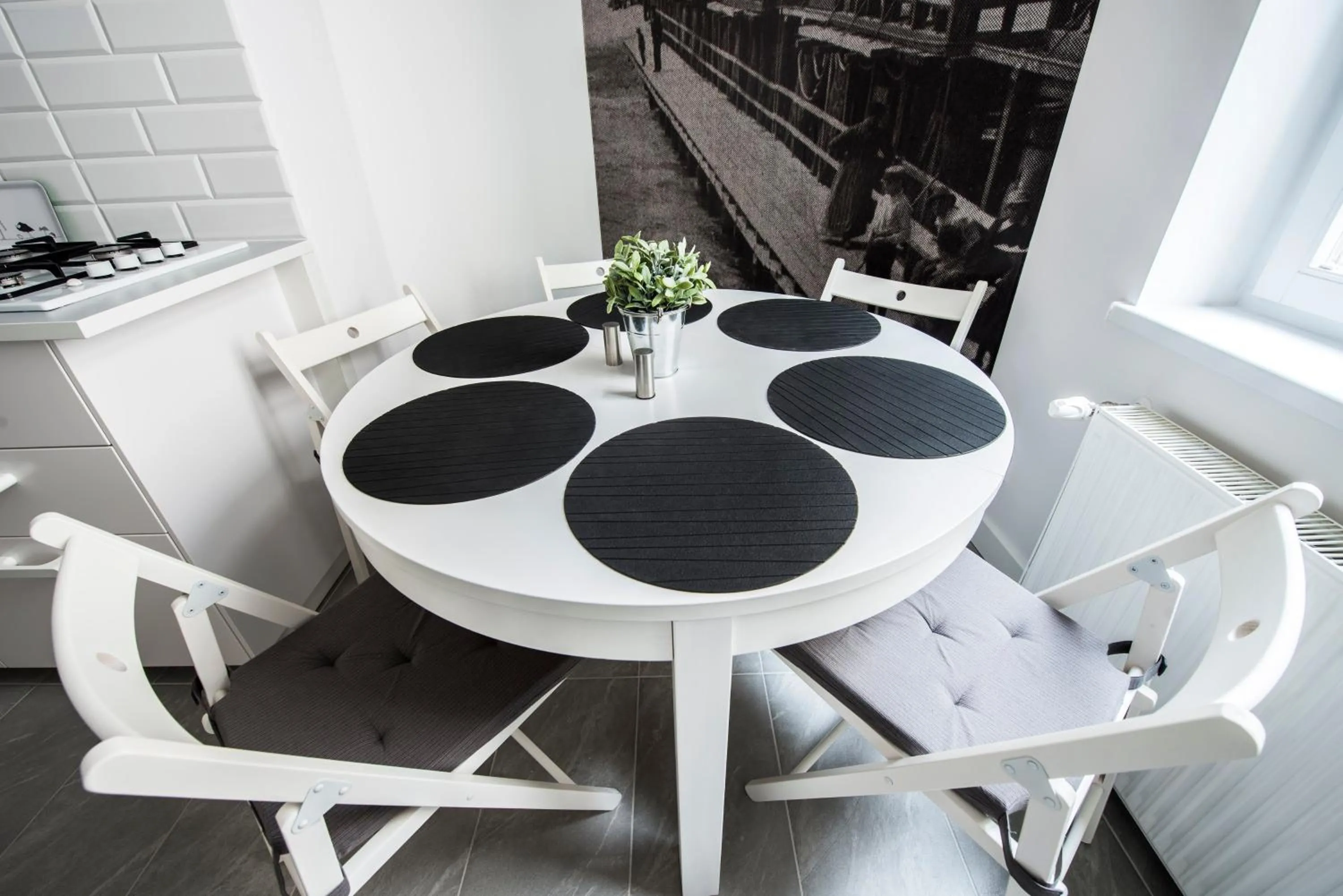 Dining area in Mieszkanie przy deptaku Sopot by OneApartments