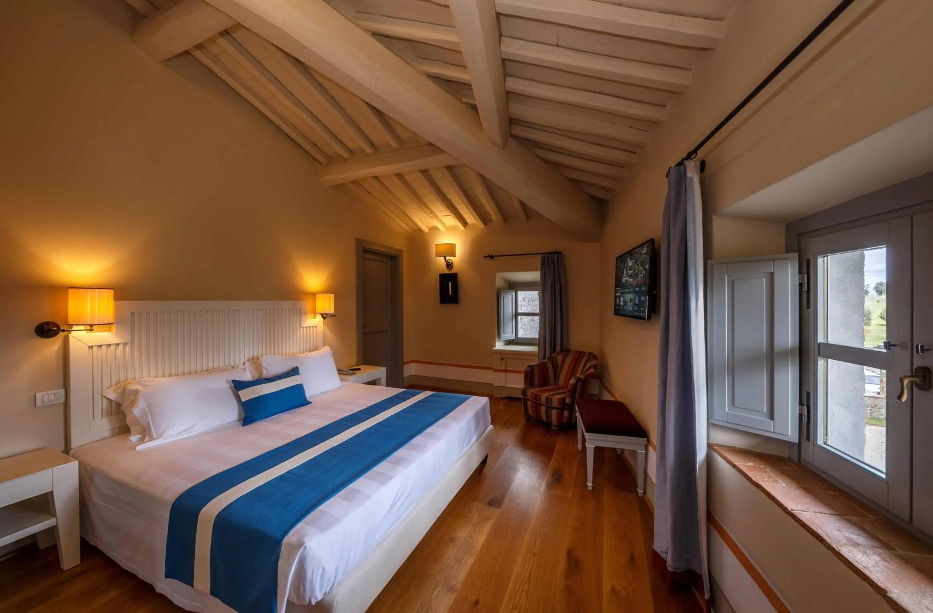 Bed in Borgo Scopeto Wine & Country Relais