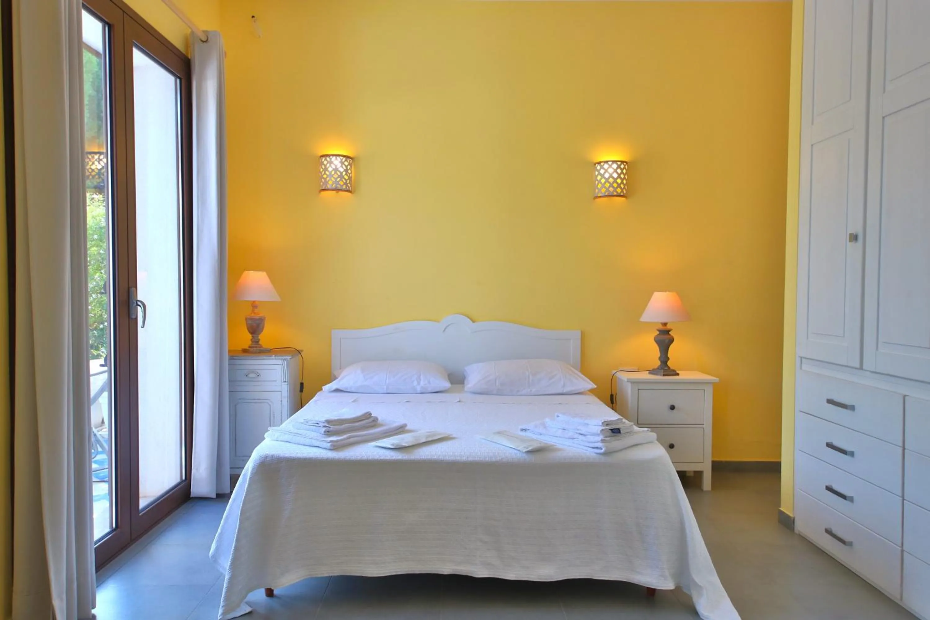 Bed in Villa i Giardini di Limoni by KlabHouse