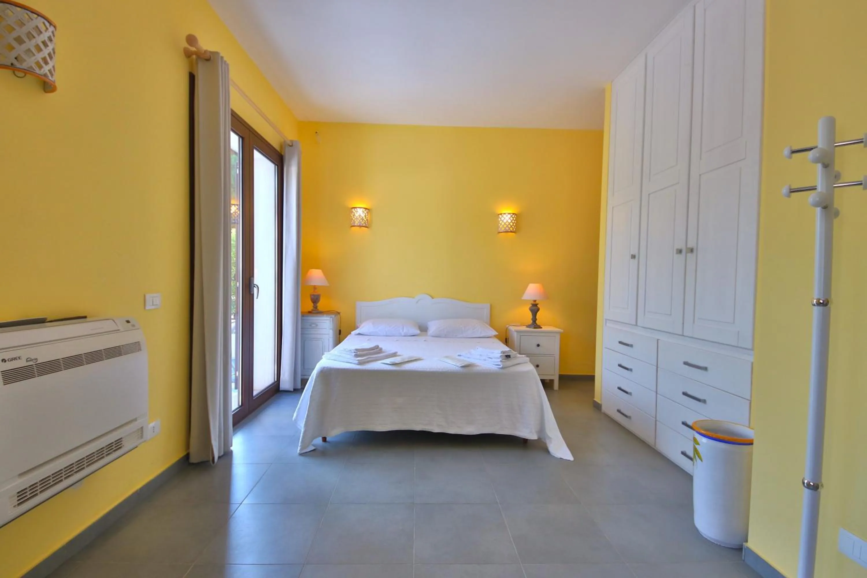 Bed in Villa i Giardini di Limoni by KlabHouse