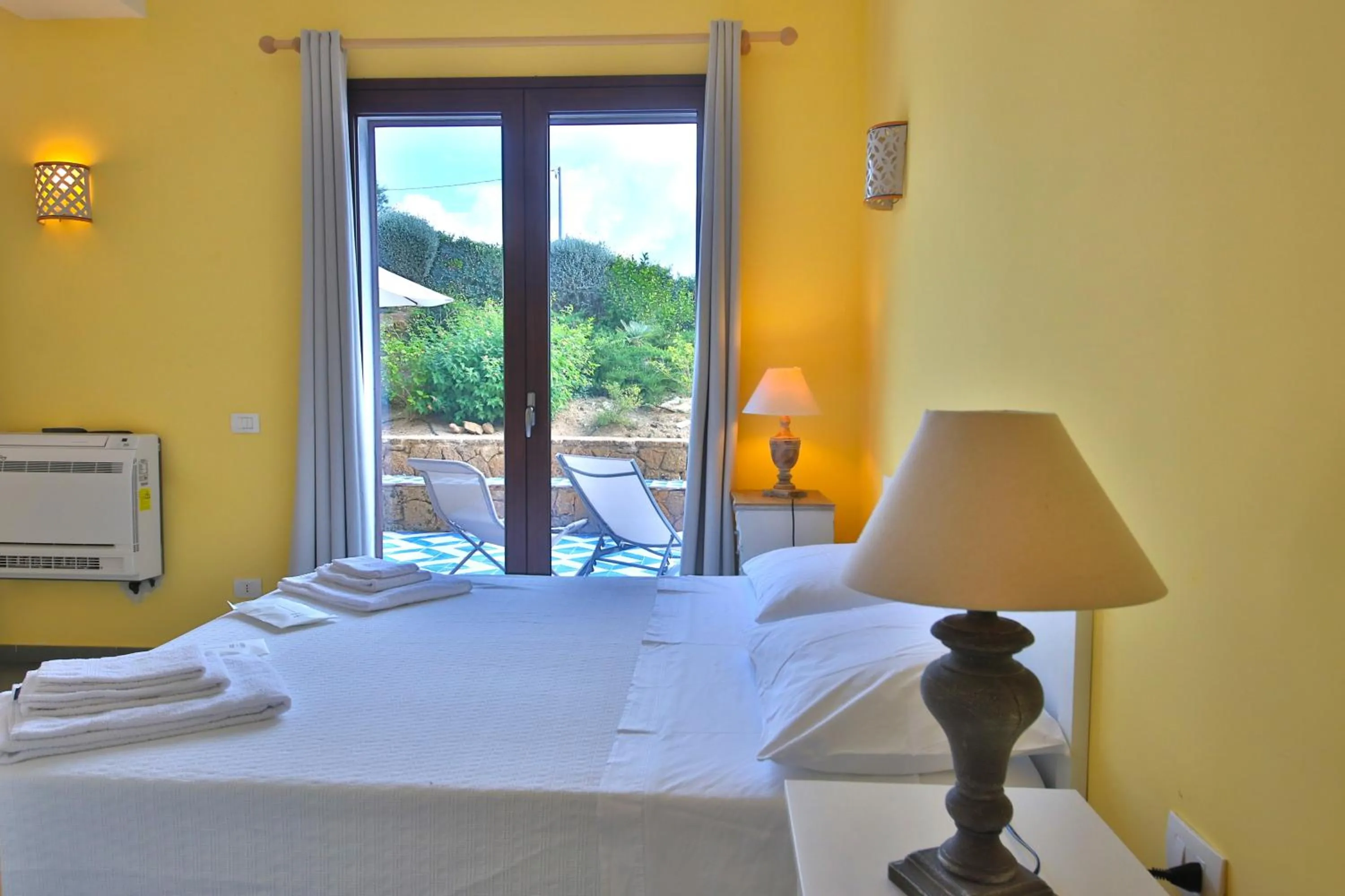 Bed in Villa i Giardini di Limoni by KlabHouse