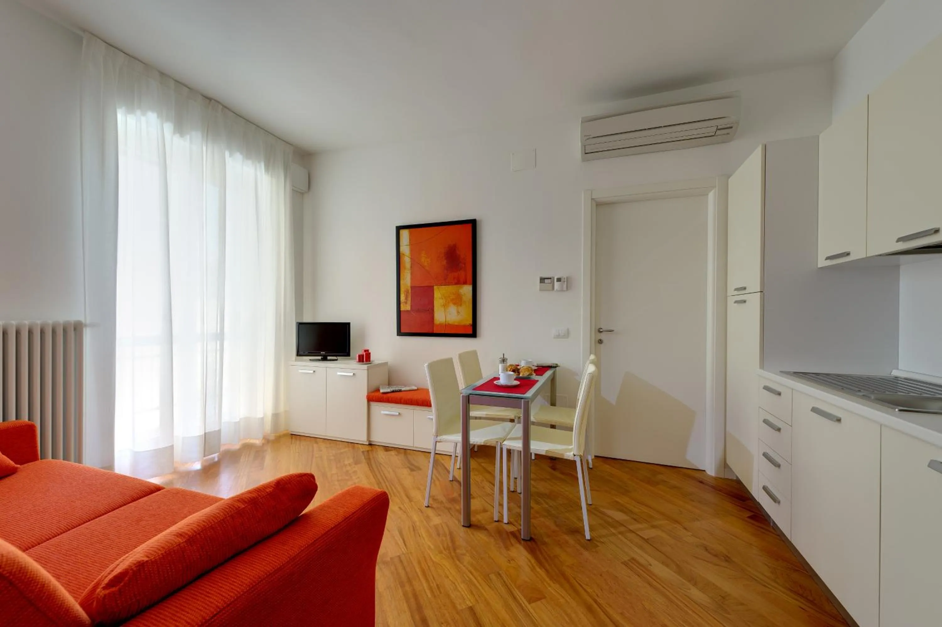 Communal lounge/ TV room in My House Apartments