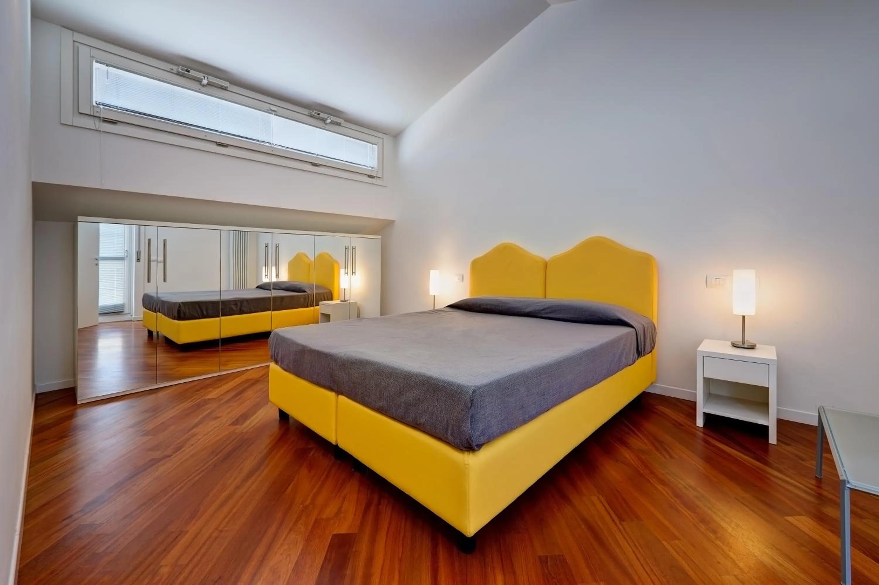 Photo of the whole room, Bed in My House Apartments