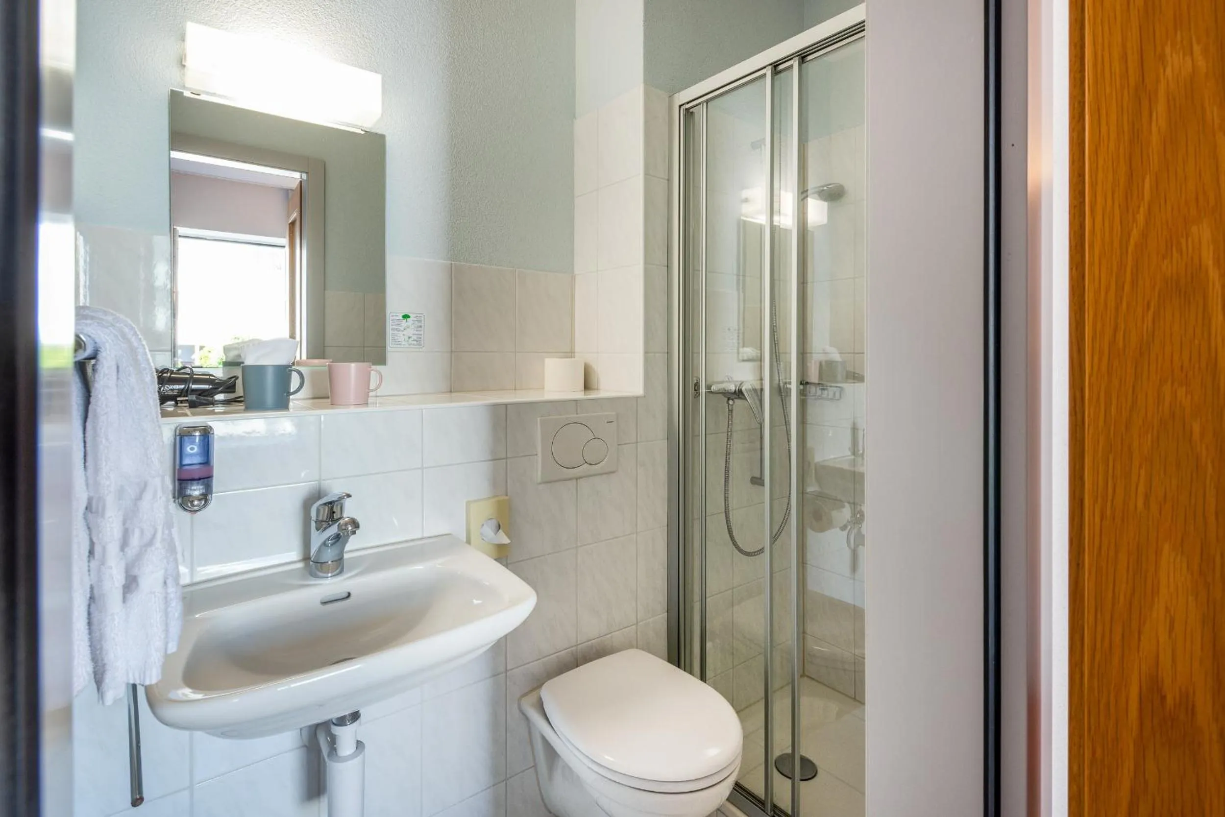 Shower in Bären Self Check-in Hotel