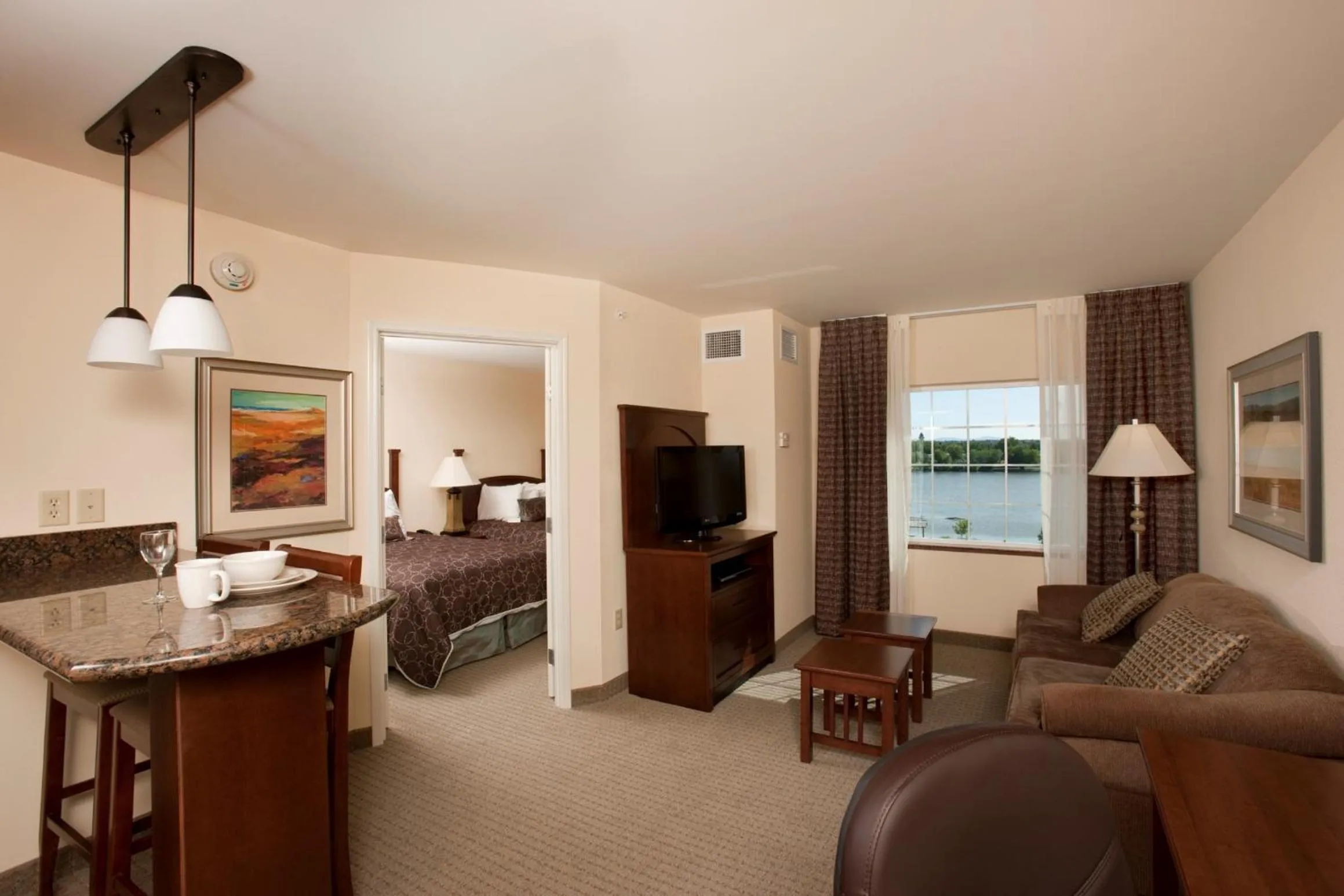 Living room, Bed in Staybridge Suites Great Falls by IHG