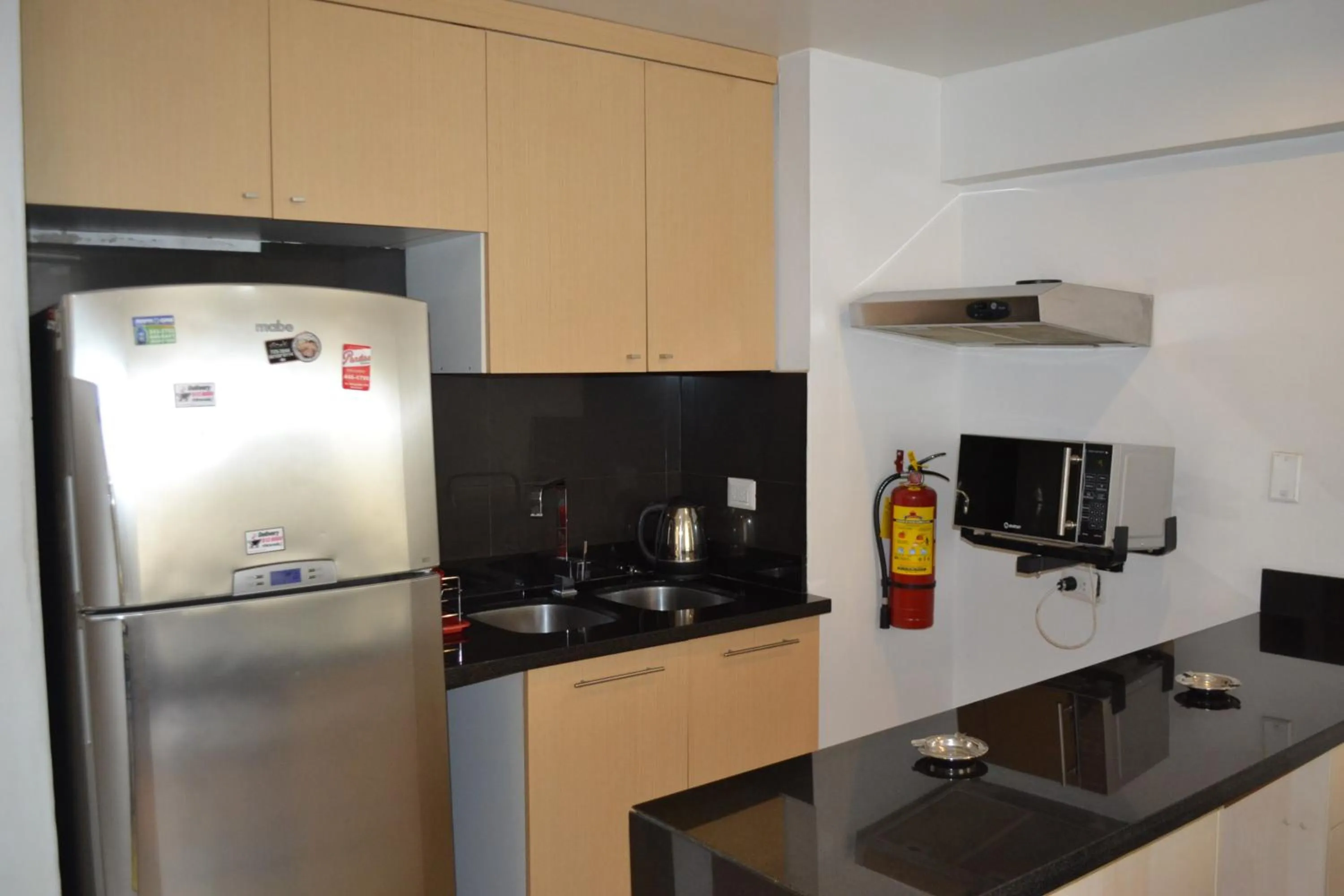 Kitchen or kitchenette in Suite Service Apart Hotel