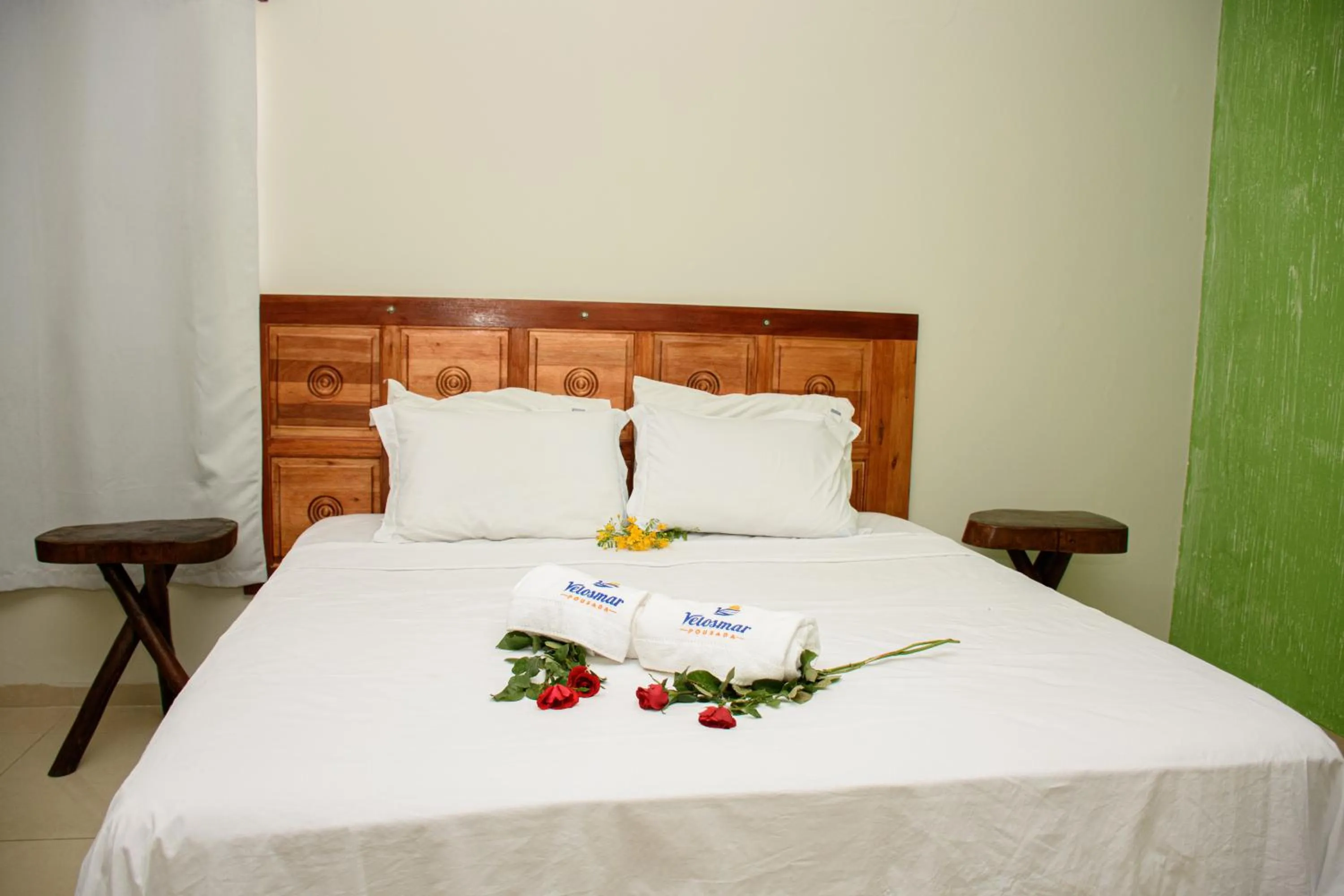 Bed in Pousada Velosmar