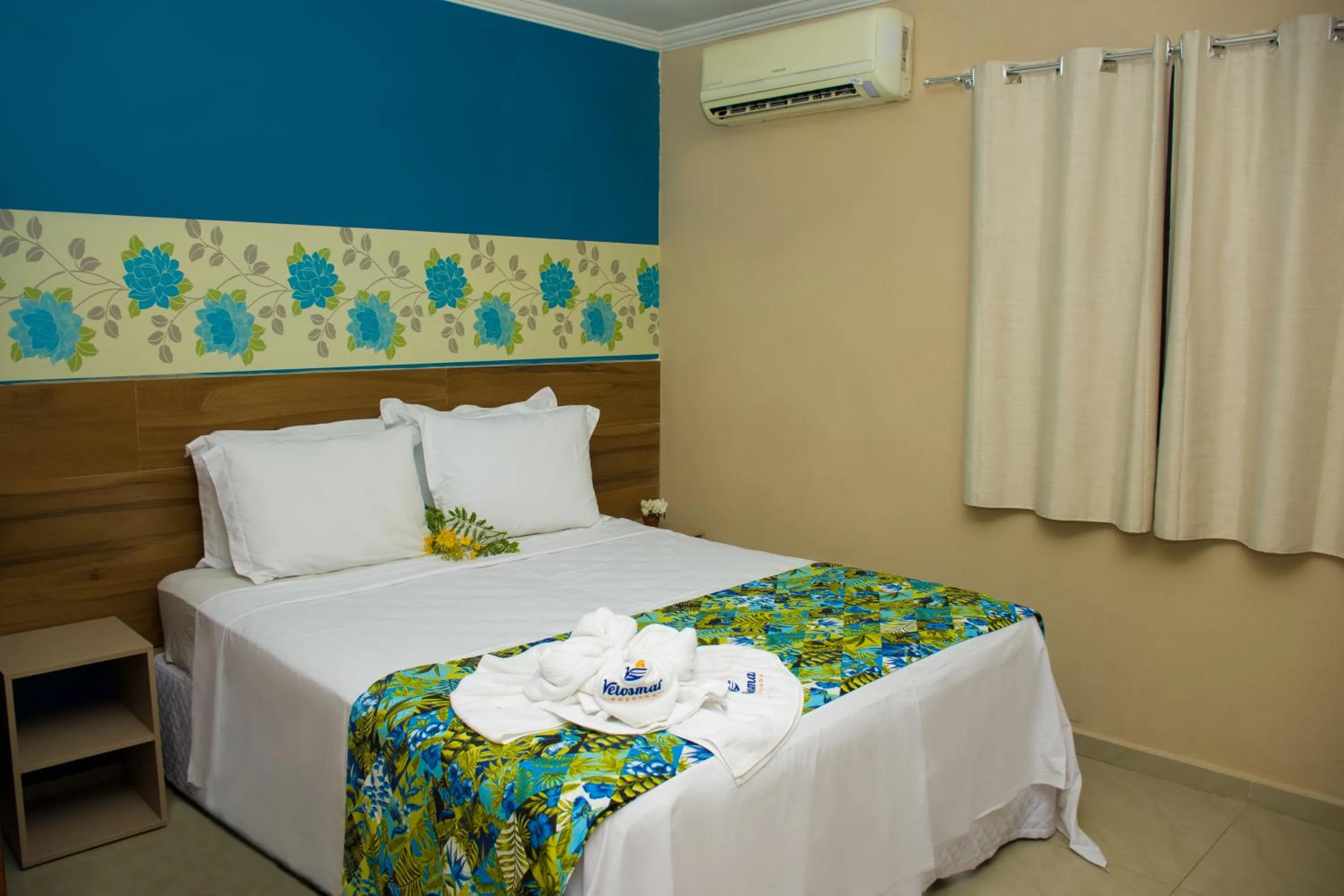 Bed in Pousada Velosmar