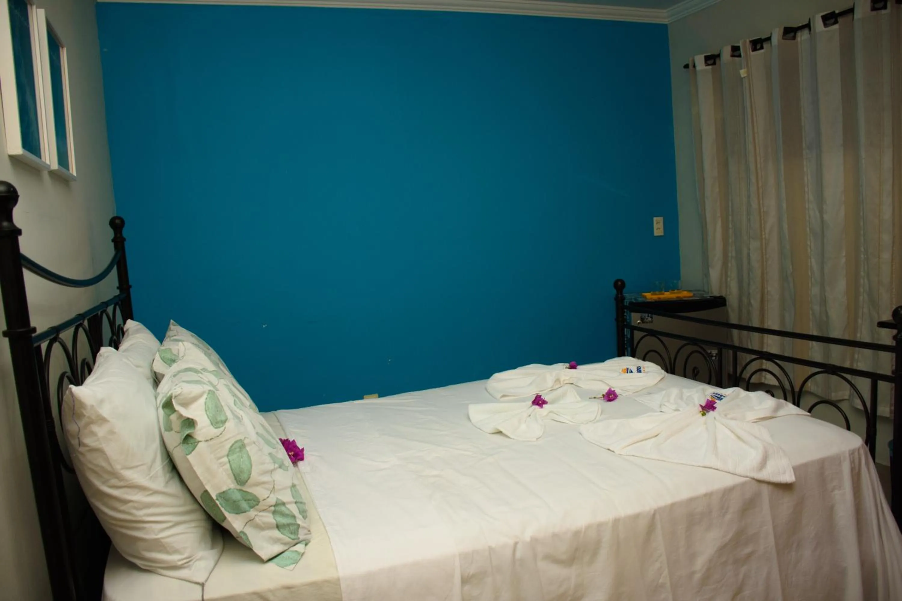 Bed in Pousada Velosmar