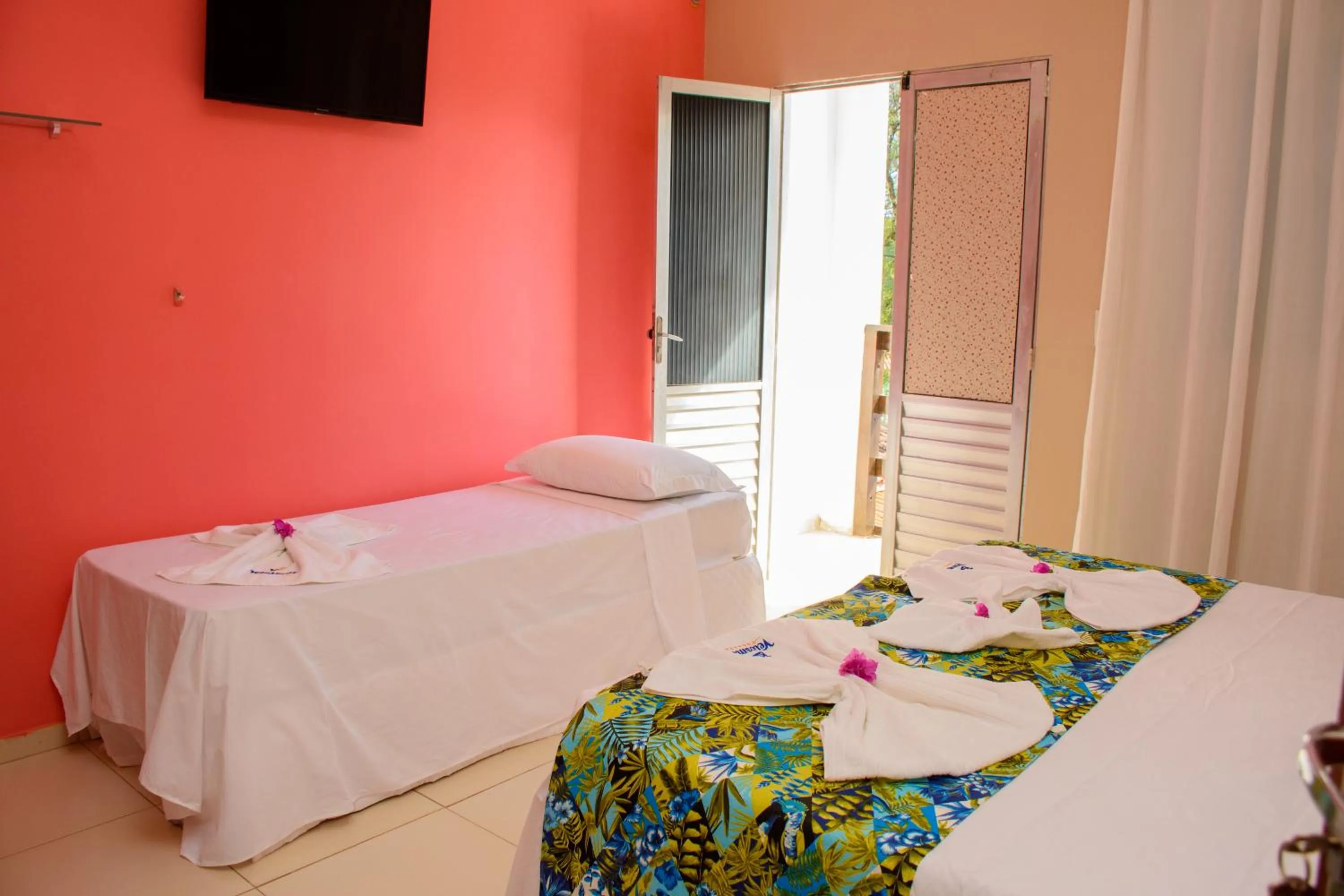 Bed in Pousada Velosmar