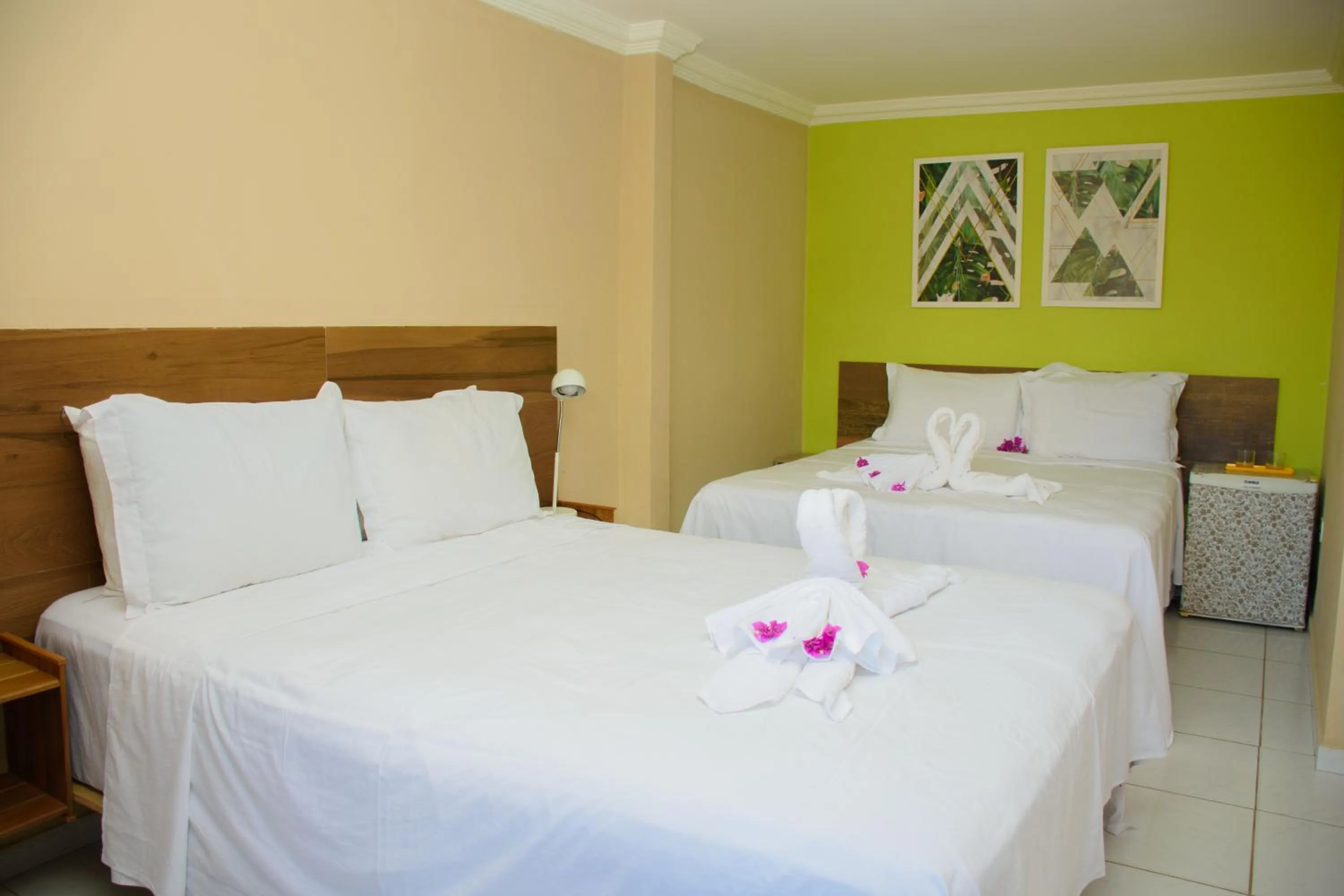 Bed in Pousada Velosmar