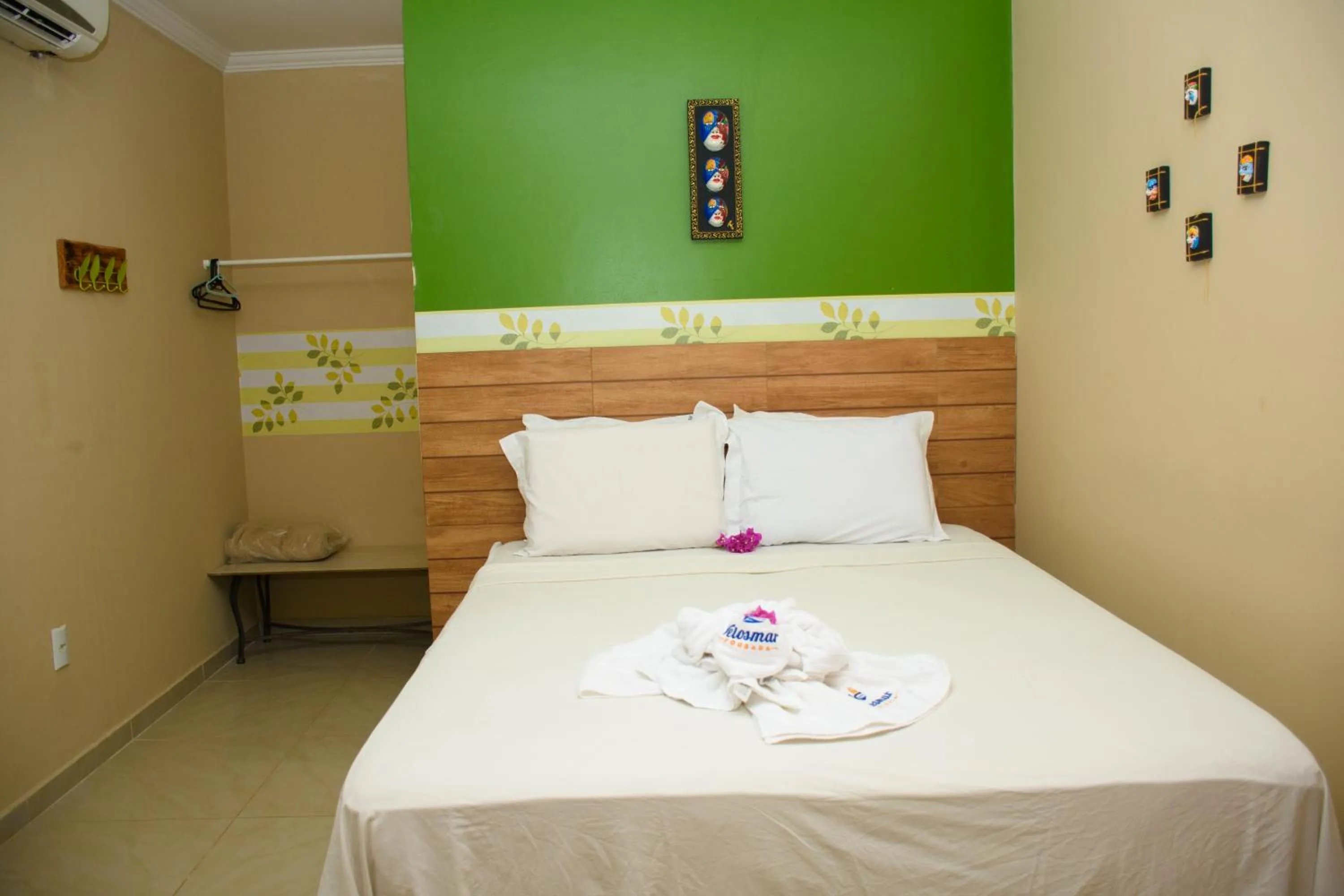 Bed in Pousada Velosmar