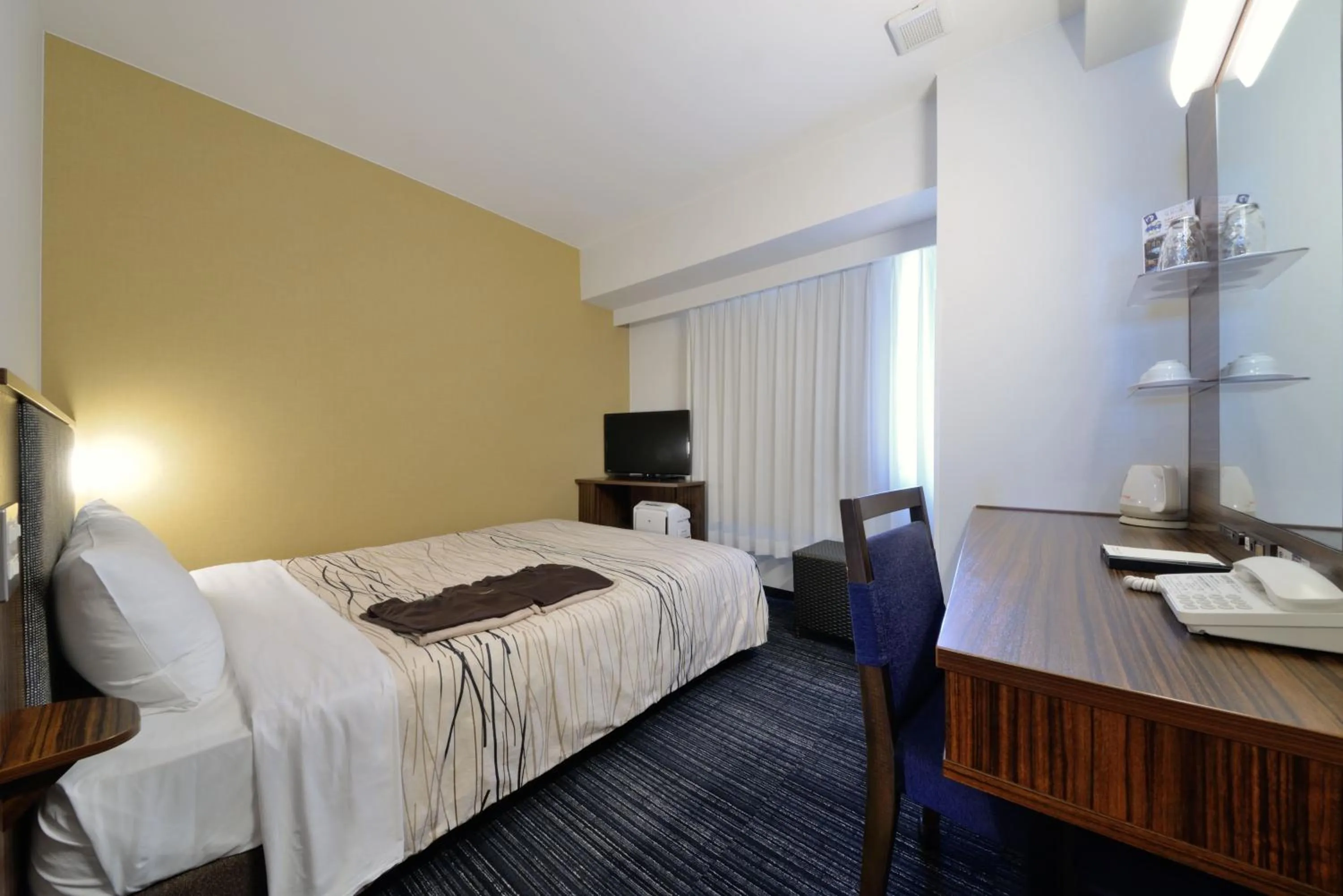 Photo of the whole room, Bed in Fukui Manten Hotel Ekimae