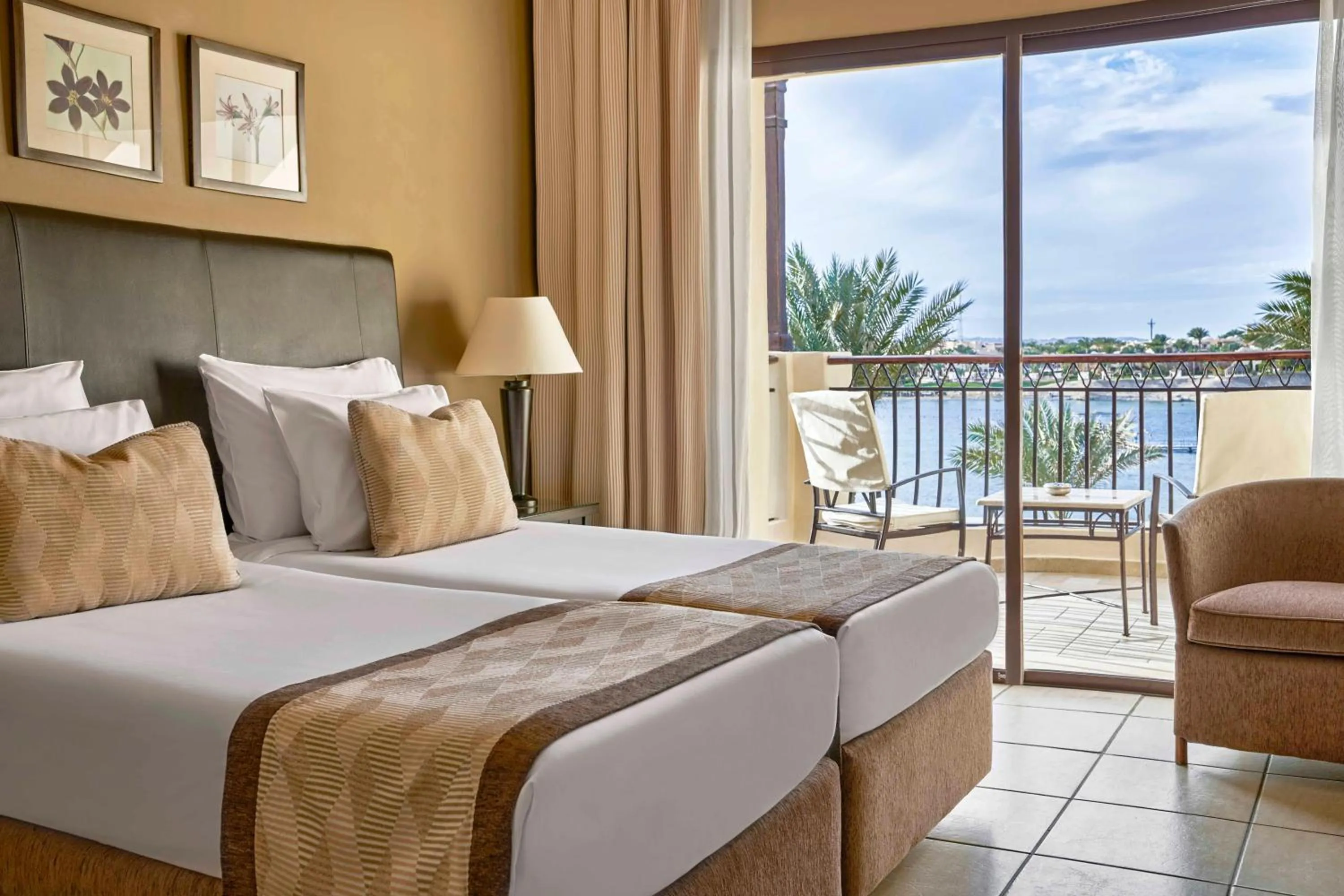 Photo of the whole room, Bed in JAZ Lamaya Resort