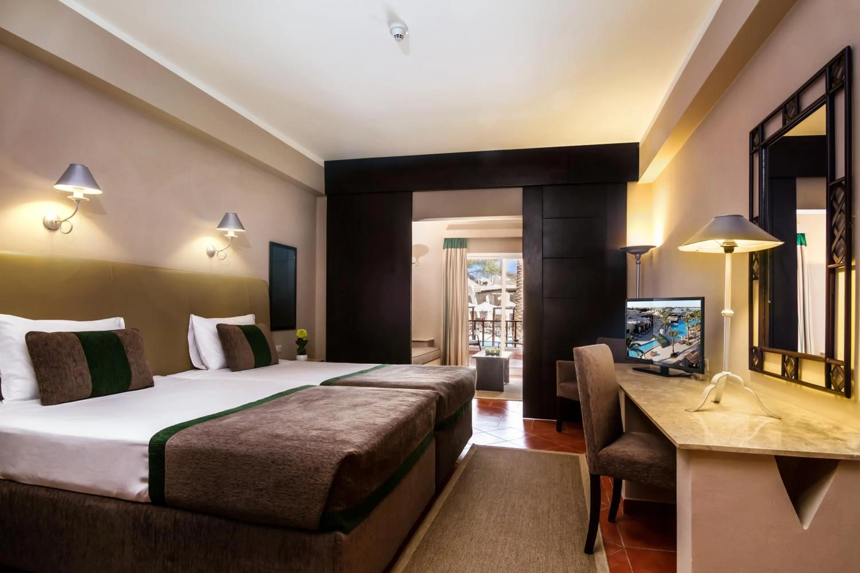 Seating area, Bed in JAZ Makadina