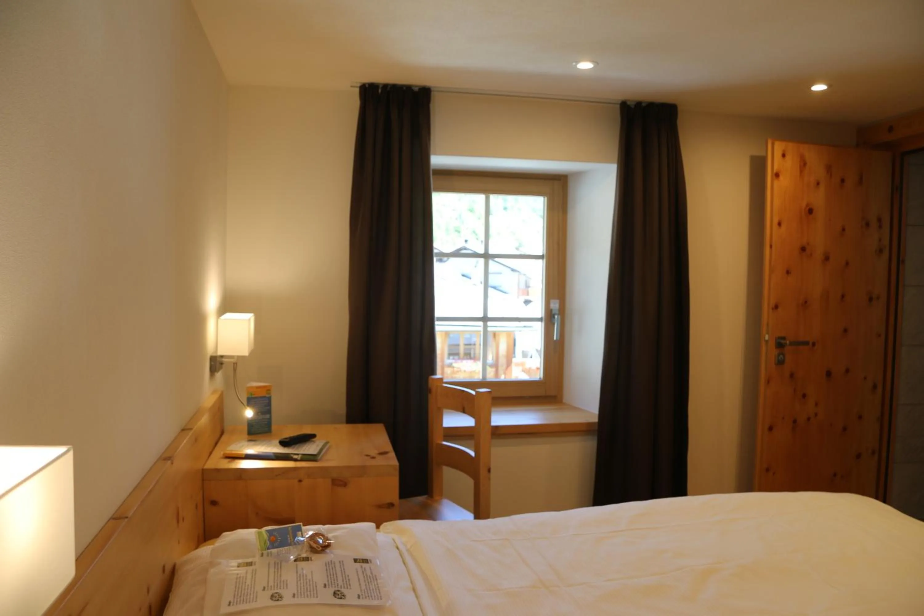 Photo of the whole room, Bed in Hotel Helvetia