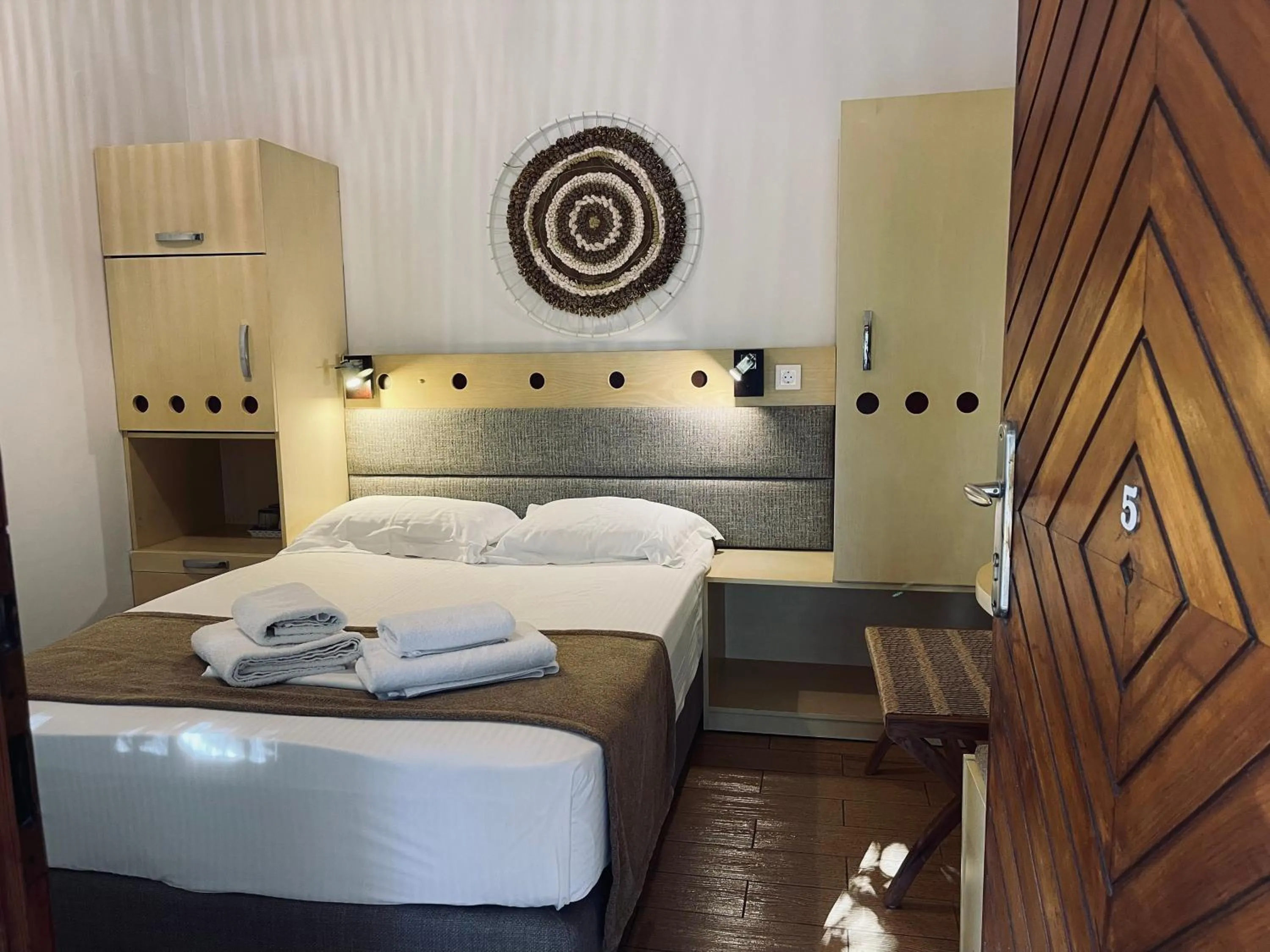 Bed in Semiramis Guesthouse