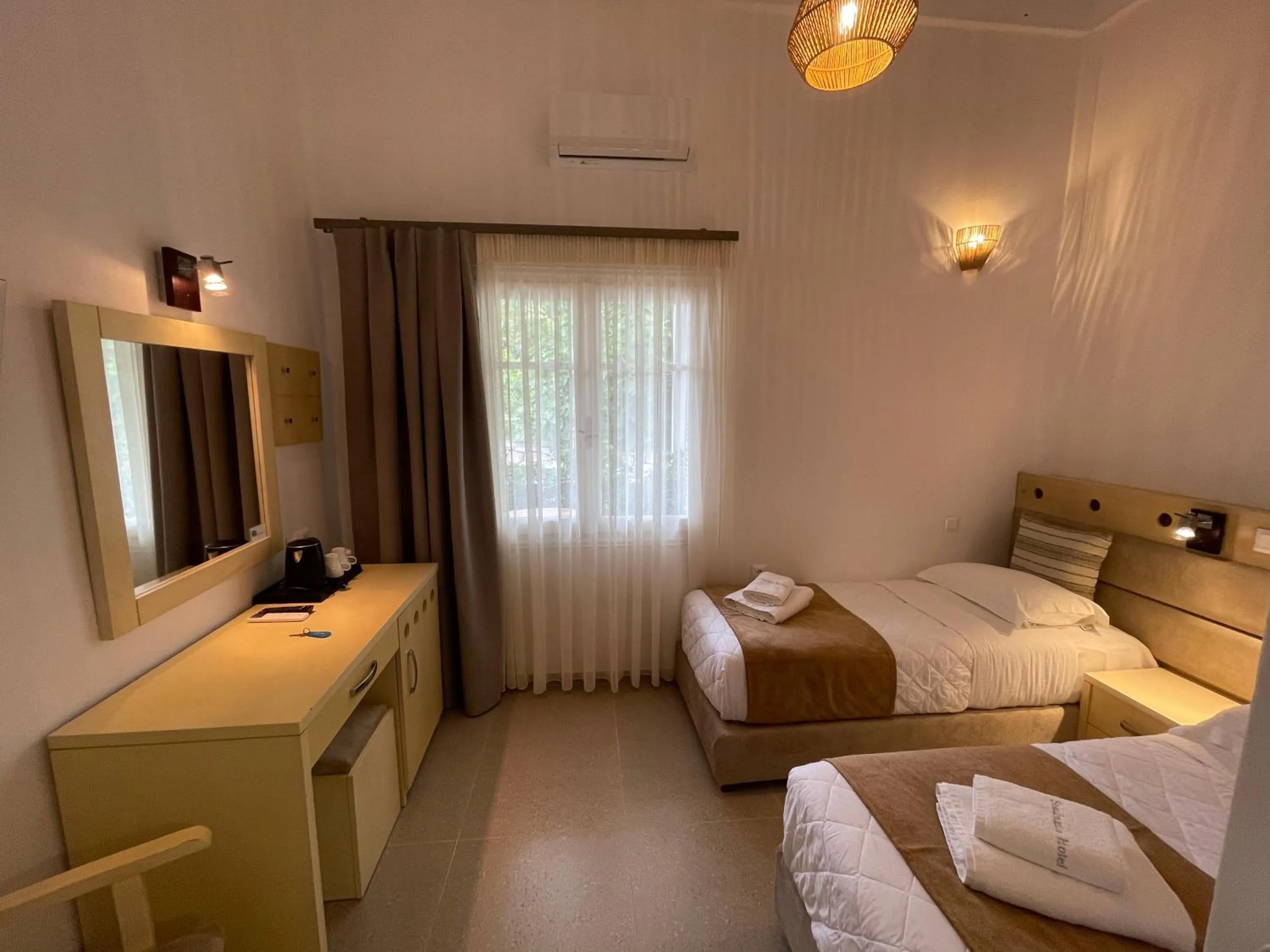 Bed in Semiramis Guesthouse