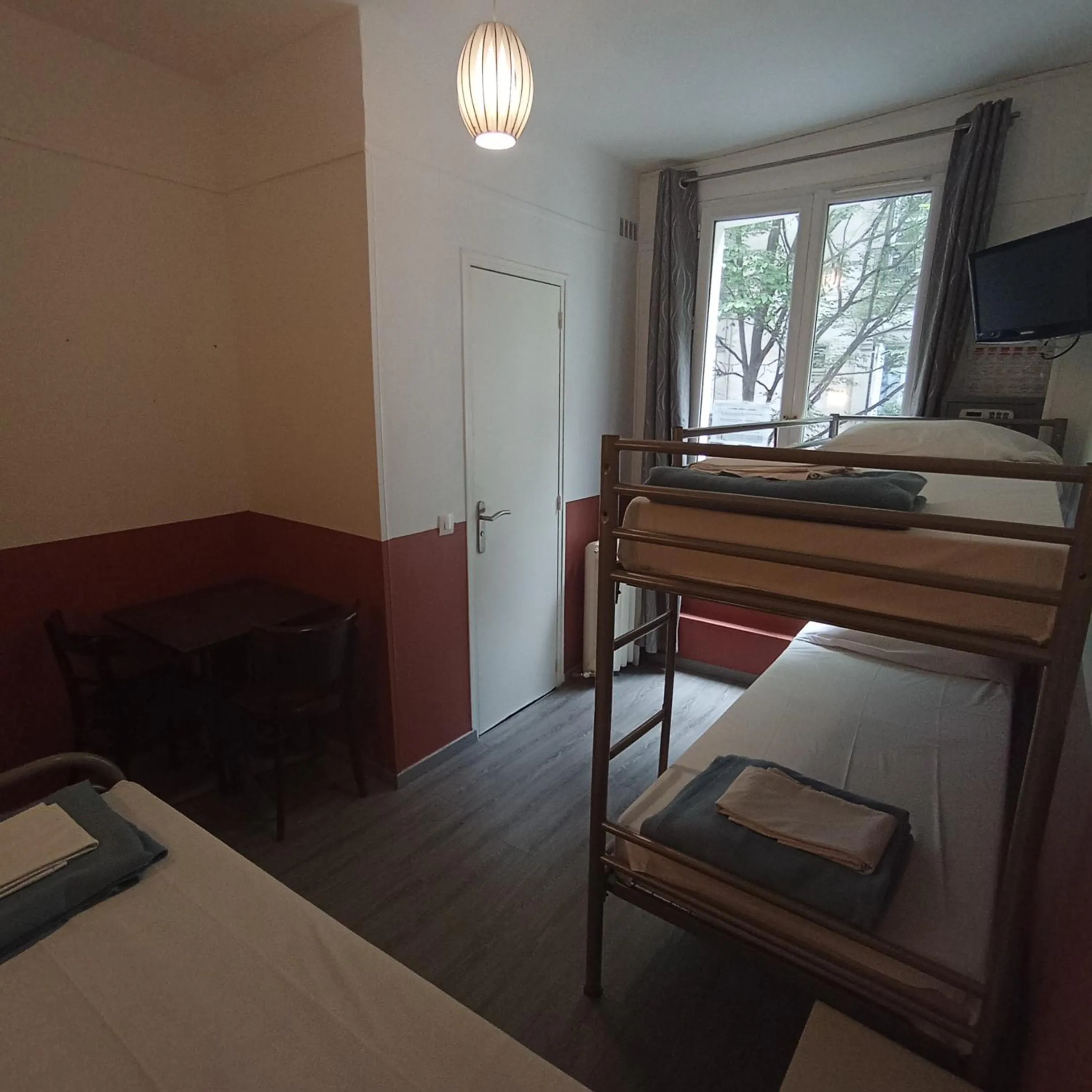 Photo of the whole room, Bed in Caulaincourt Montmartre by Hiphophostels