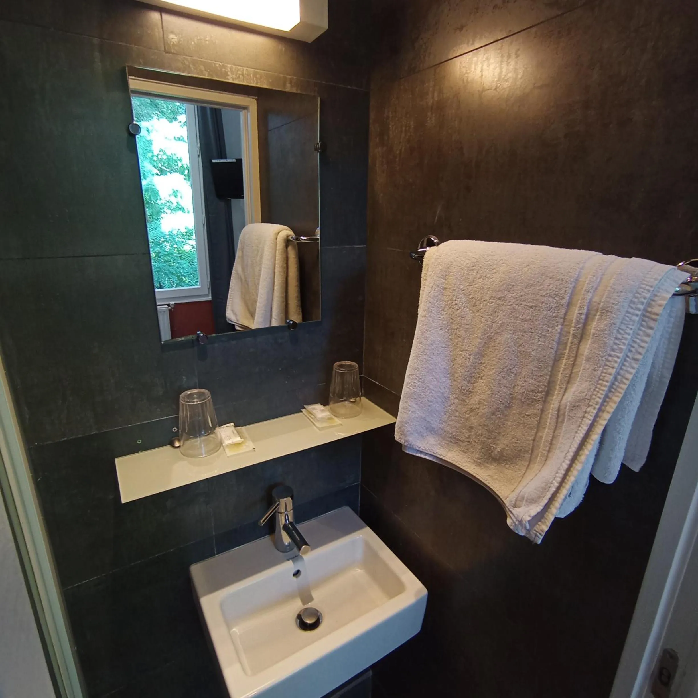 Bathroom in Caulaincourt Montmartre by Hiphophostels