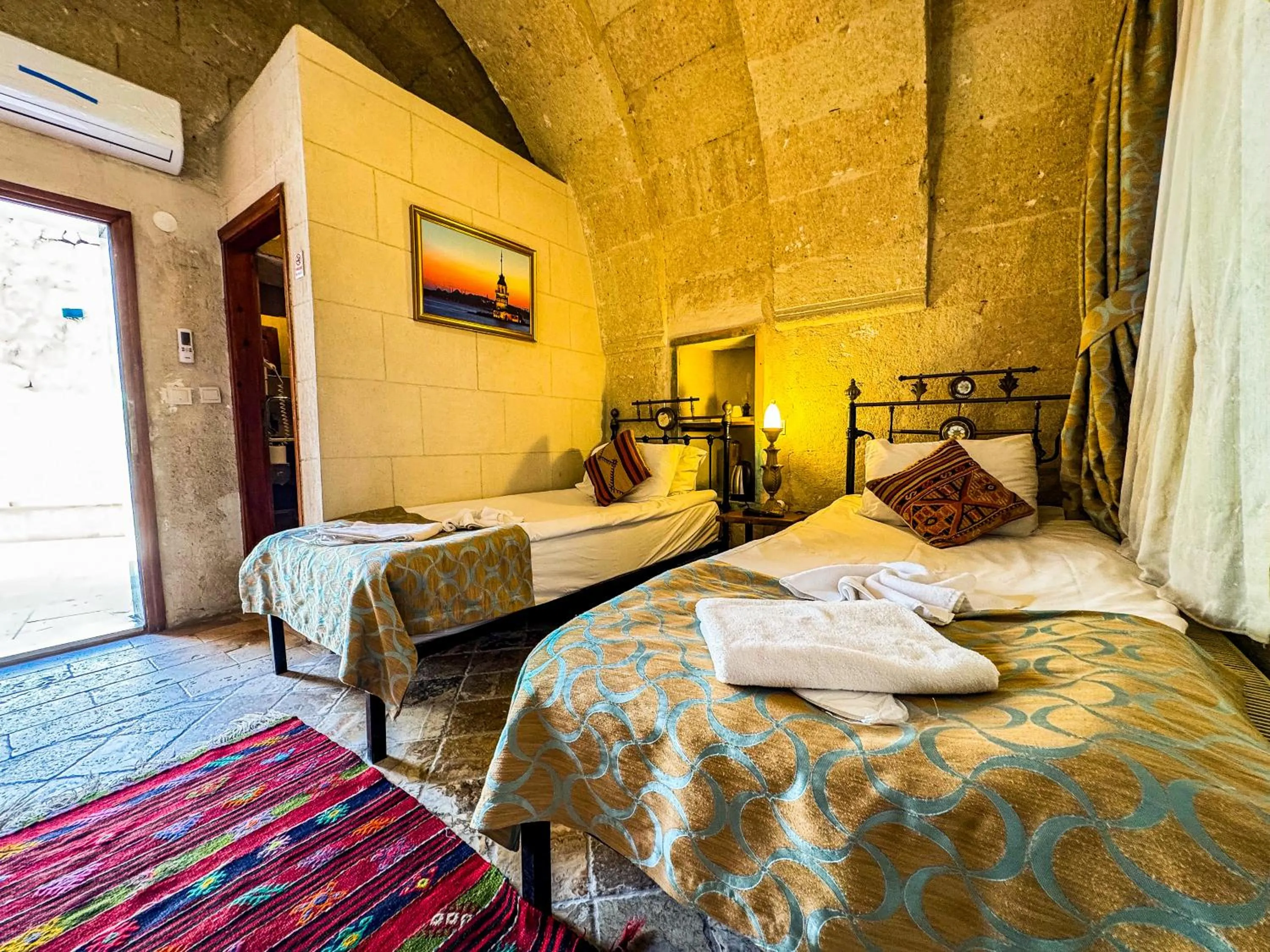 Bed in Nomads Cave Hotel & Rooftop