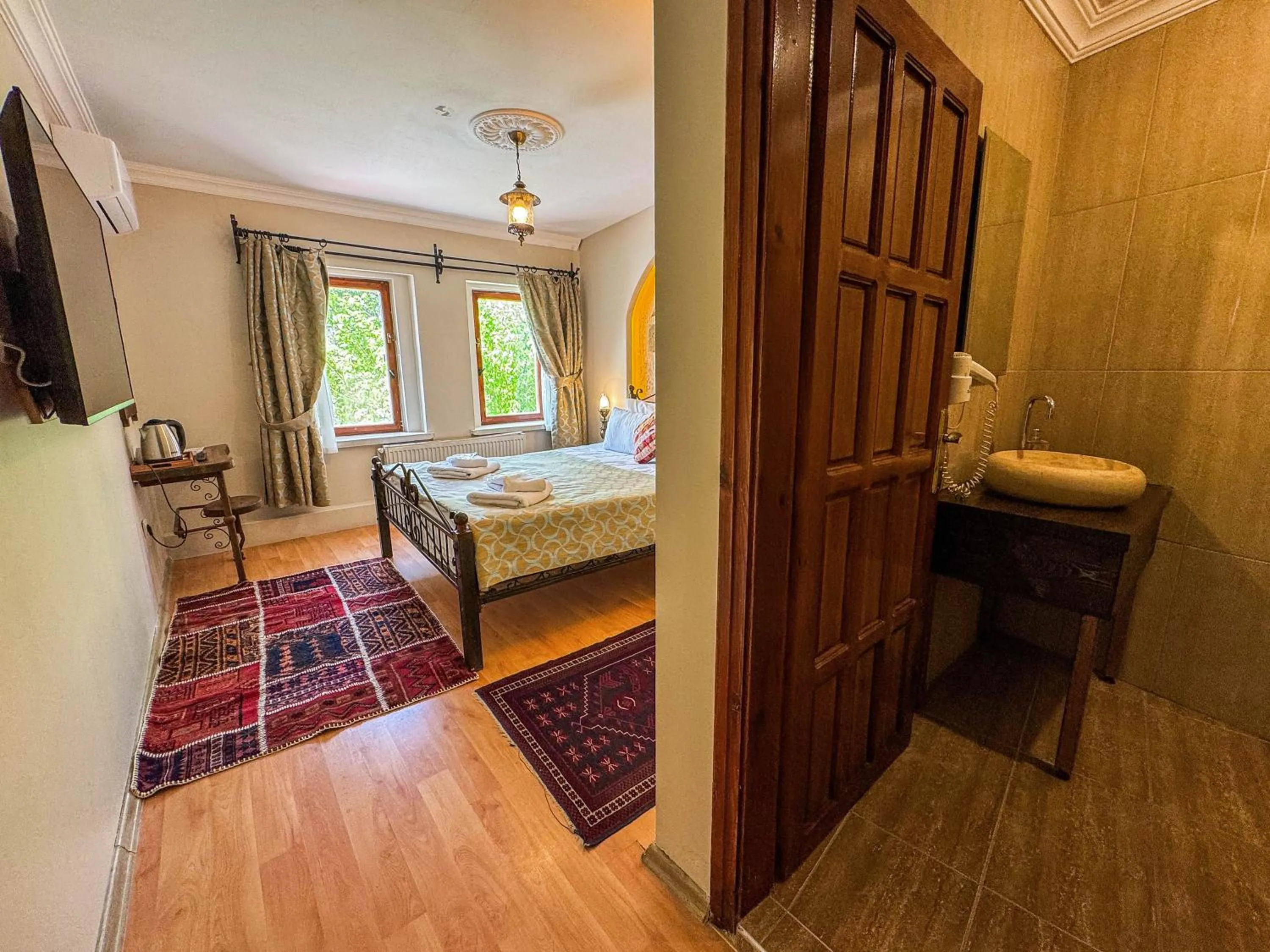 Bed in Nomads Cave Hotel & Rooftop