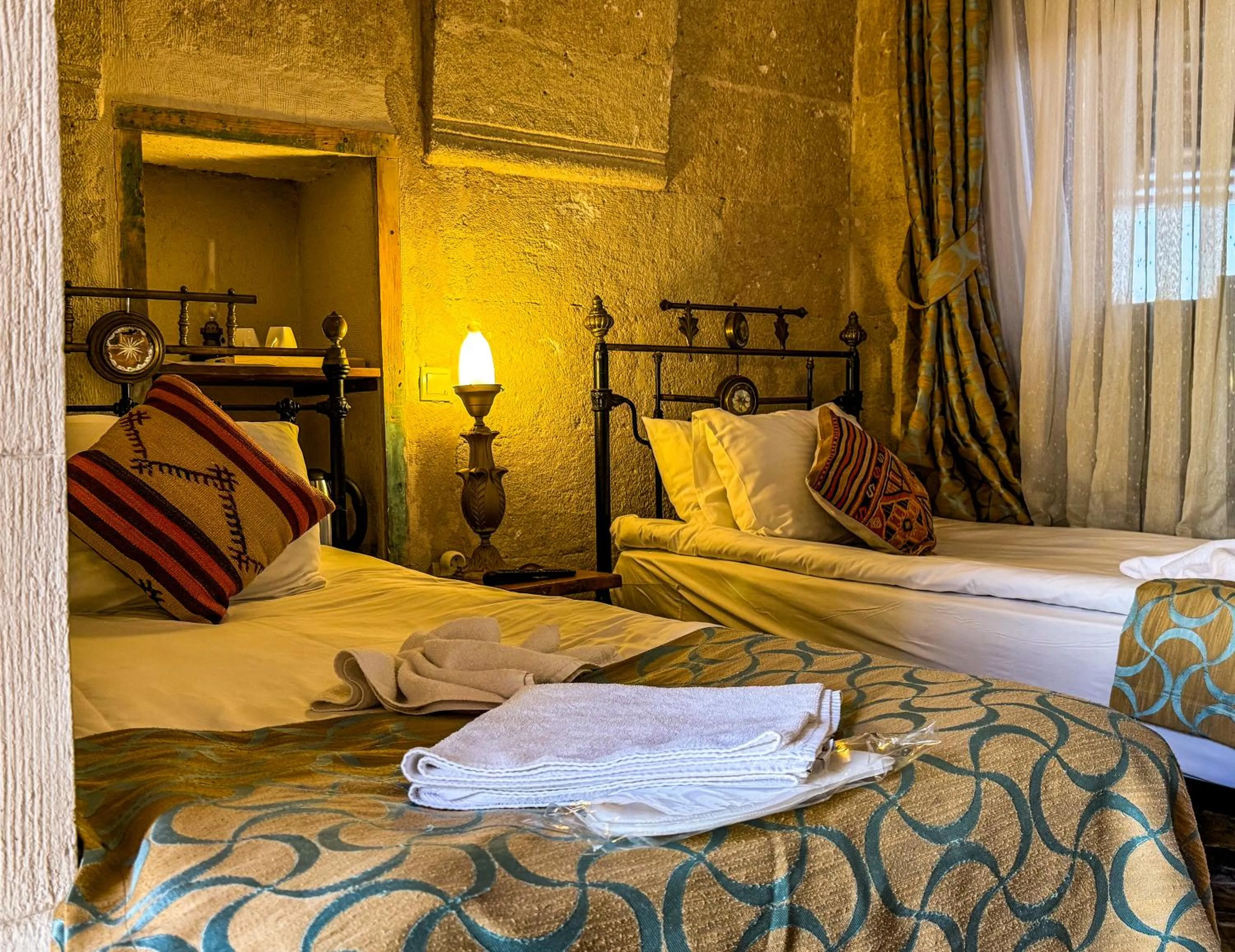 Bed in Nomads Cave Hotel & Rooftop