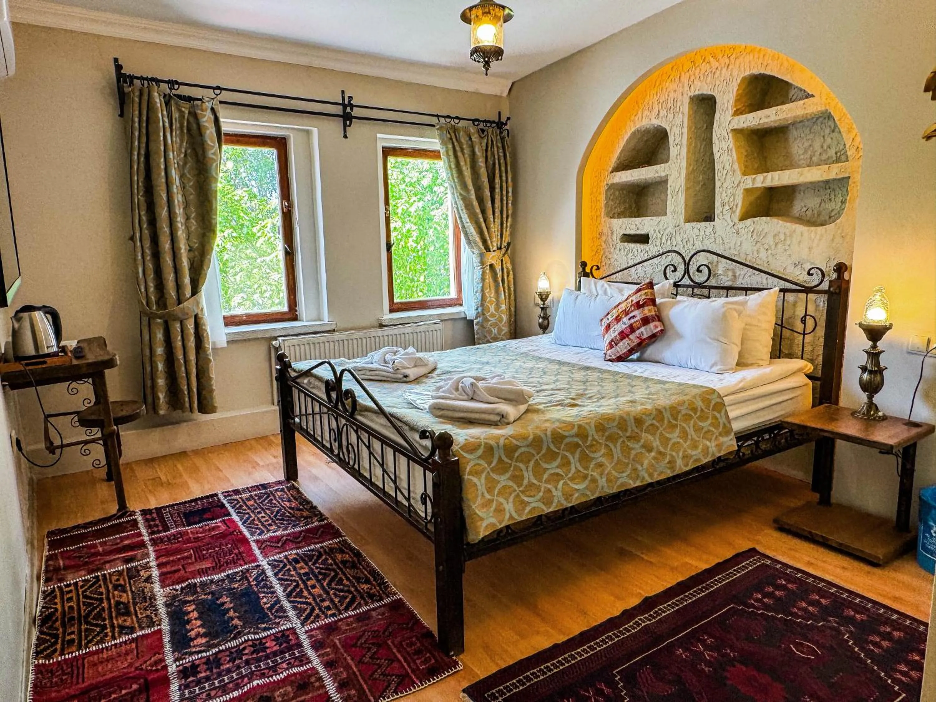 Bed in Nomads Cave Hotel & Rooftop