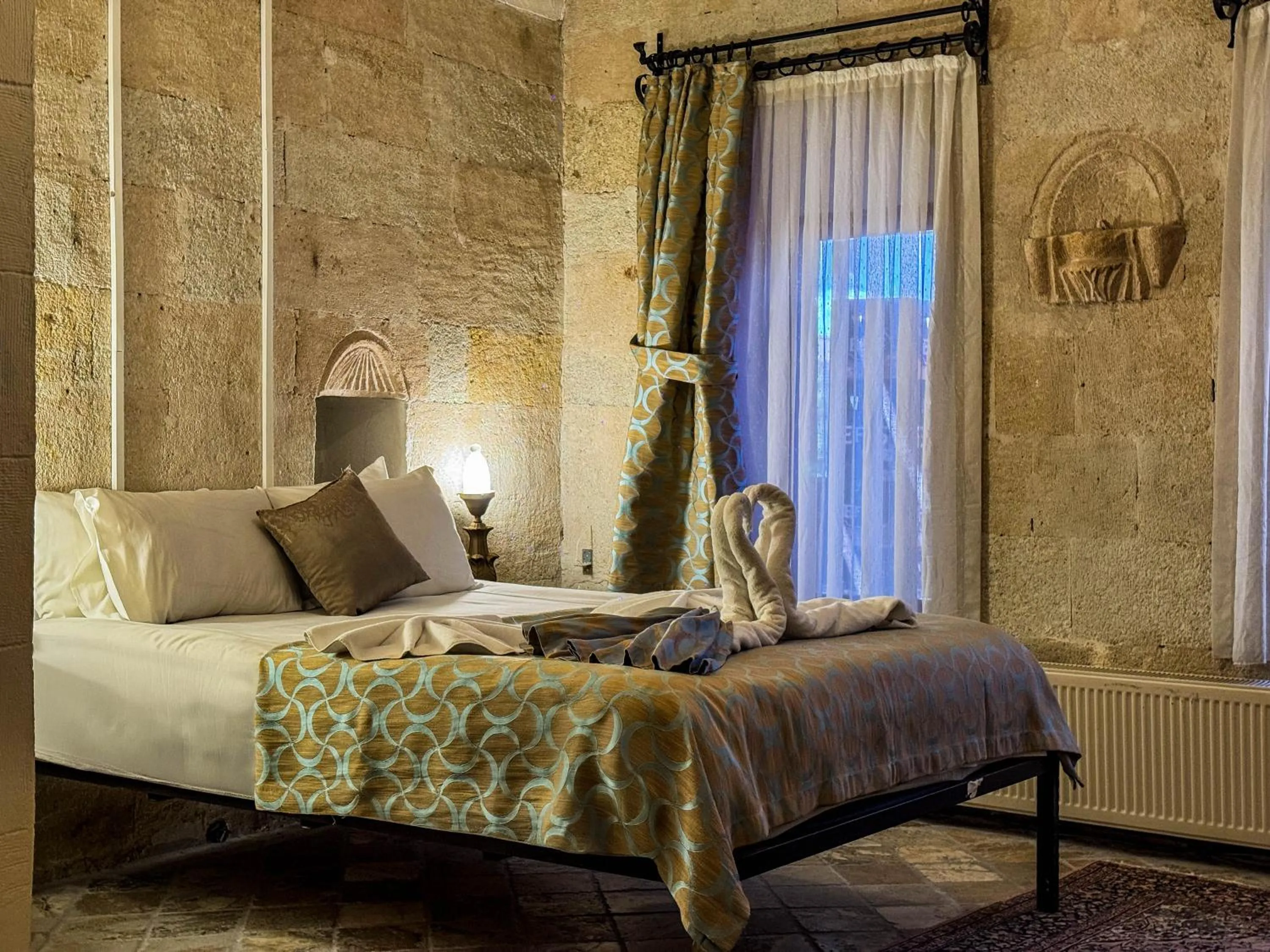 Bed in Nomads Cave Hotel & Rooftop