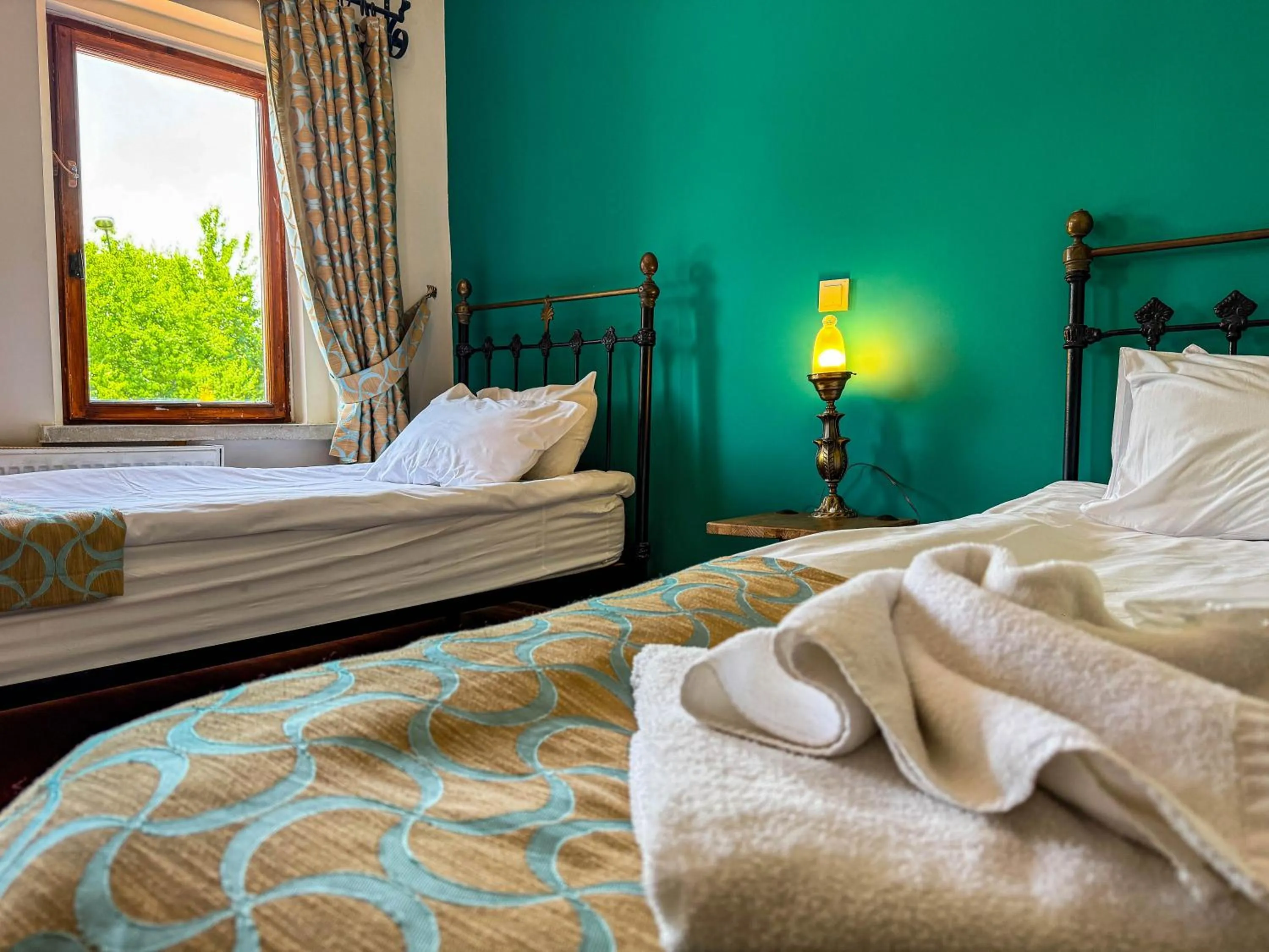 Bed in Nomads Cave Hotel & Rooftop