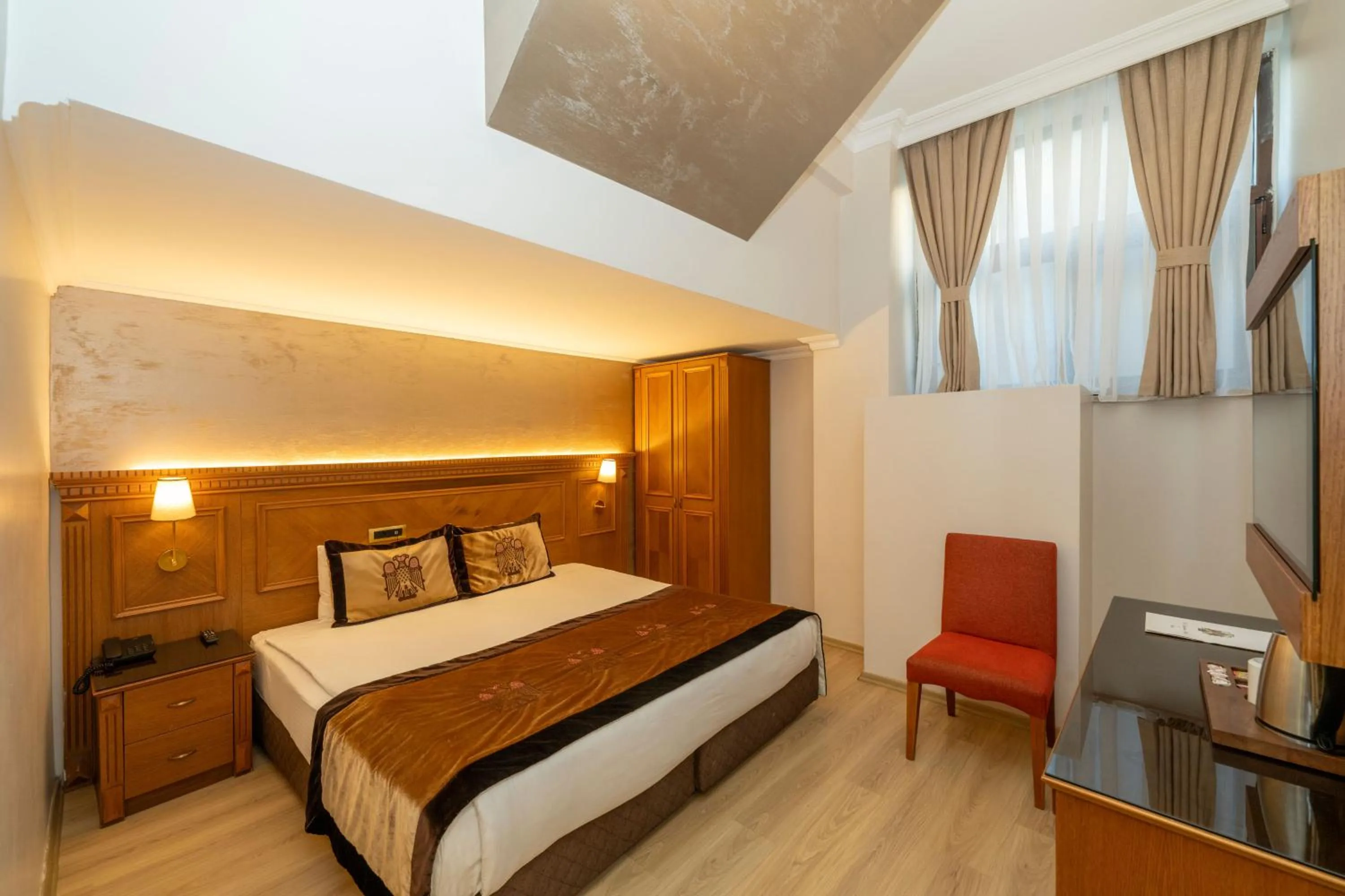 Photo of the whole room, Bed in The Byzantium Suites Hotel & Spa