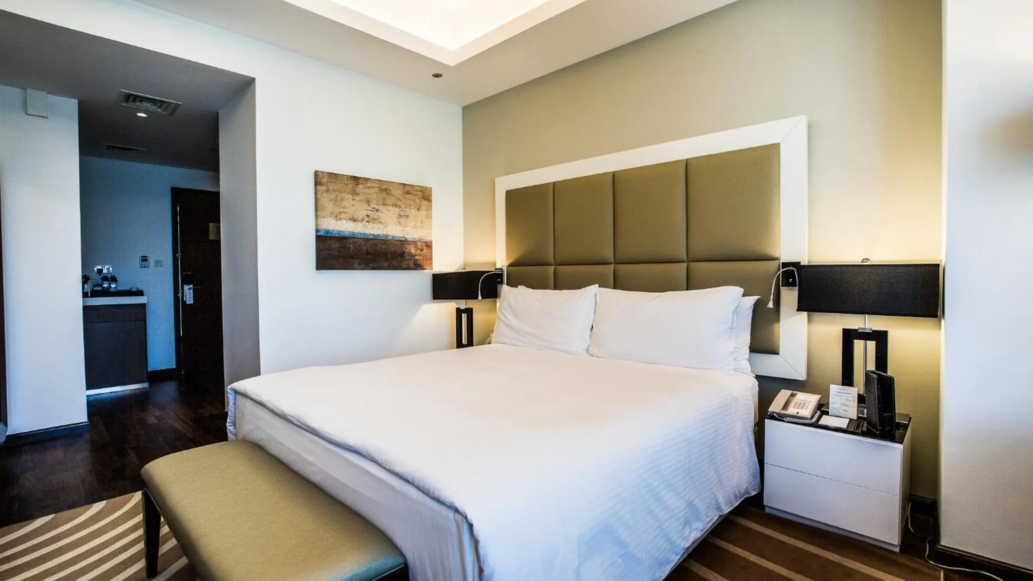 Bed in La Suite Dubai Hotel & Apartments