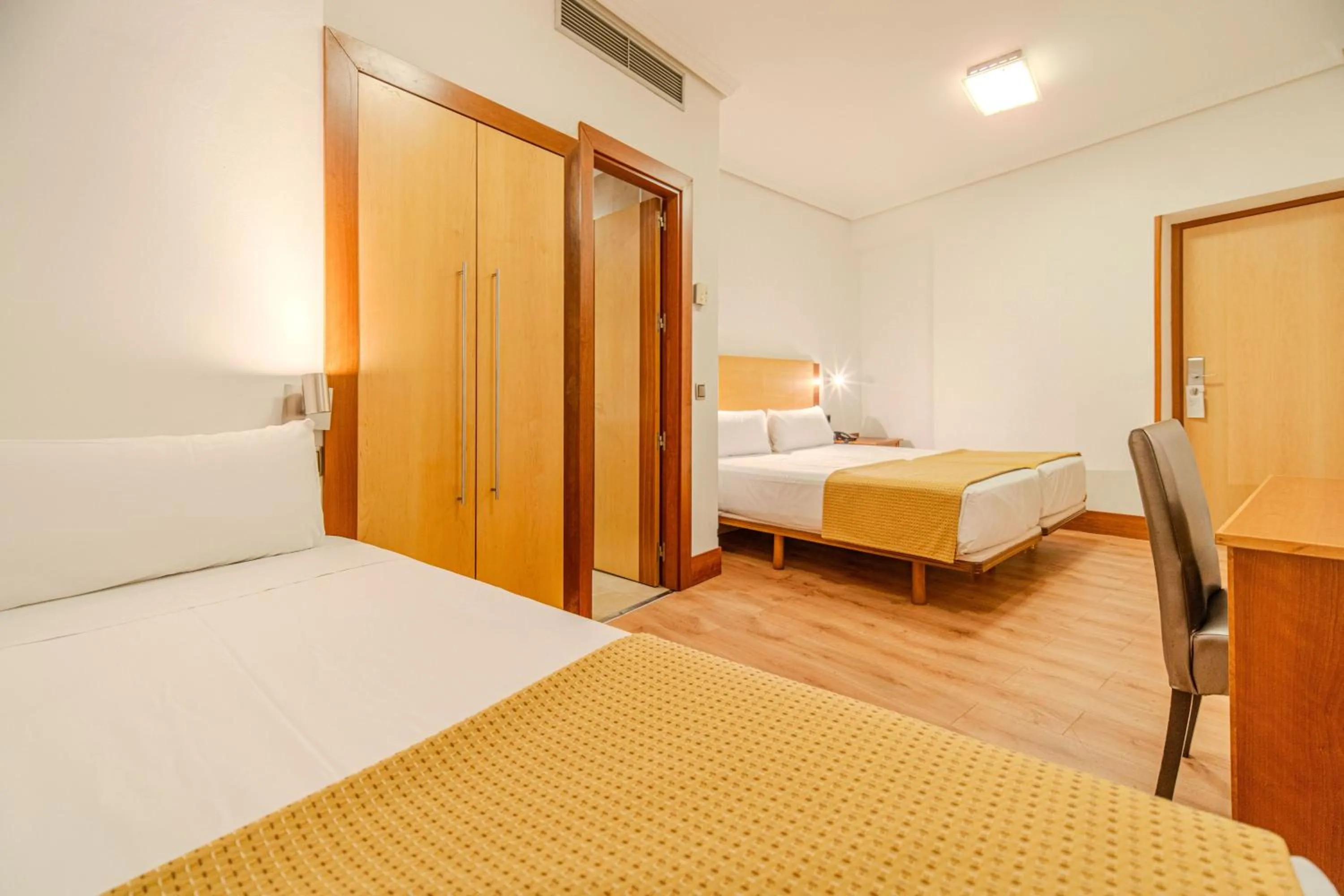 Photo of the whole room, Bed in ITC Mora by Soho Boutique