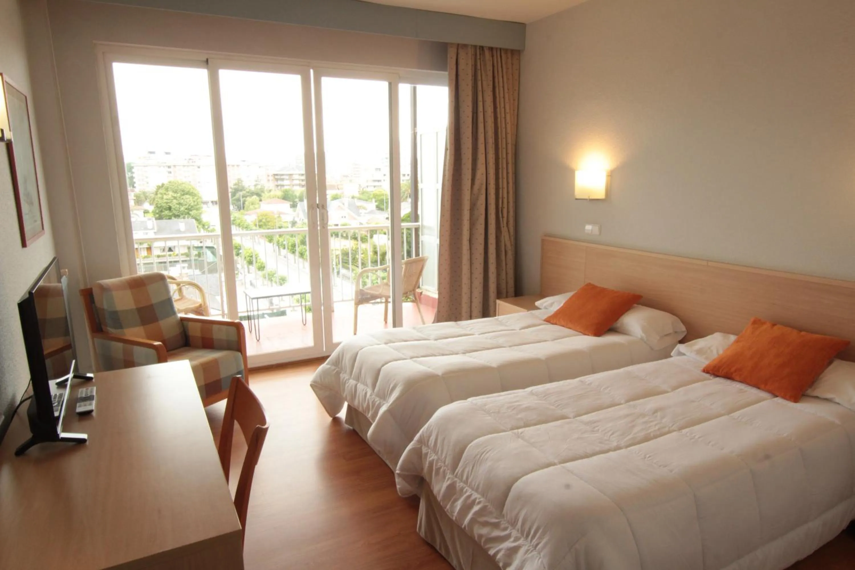 Bed in Hotel Cosmopol