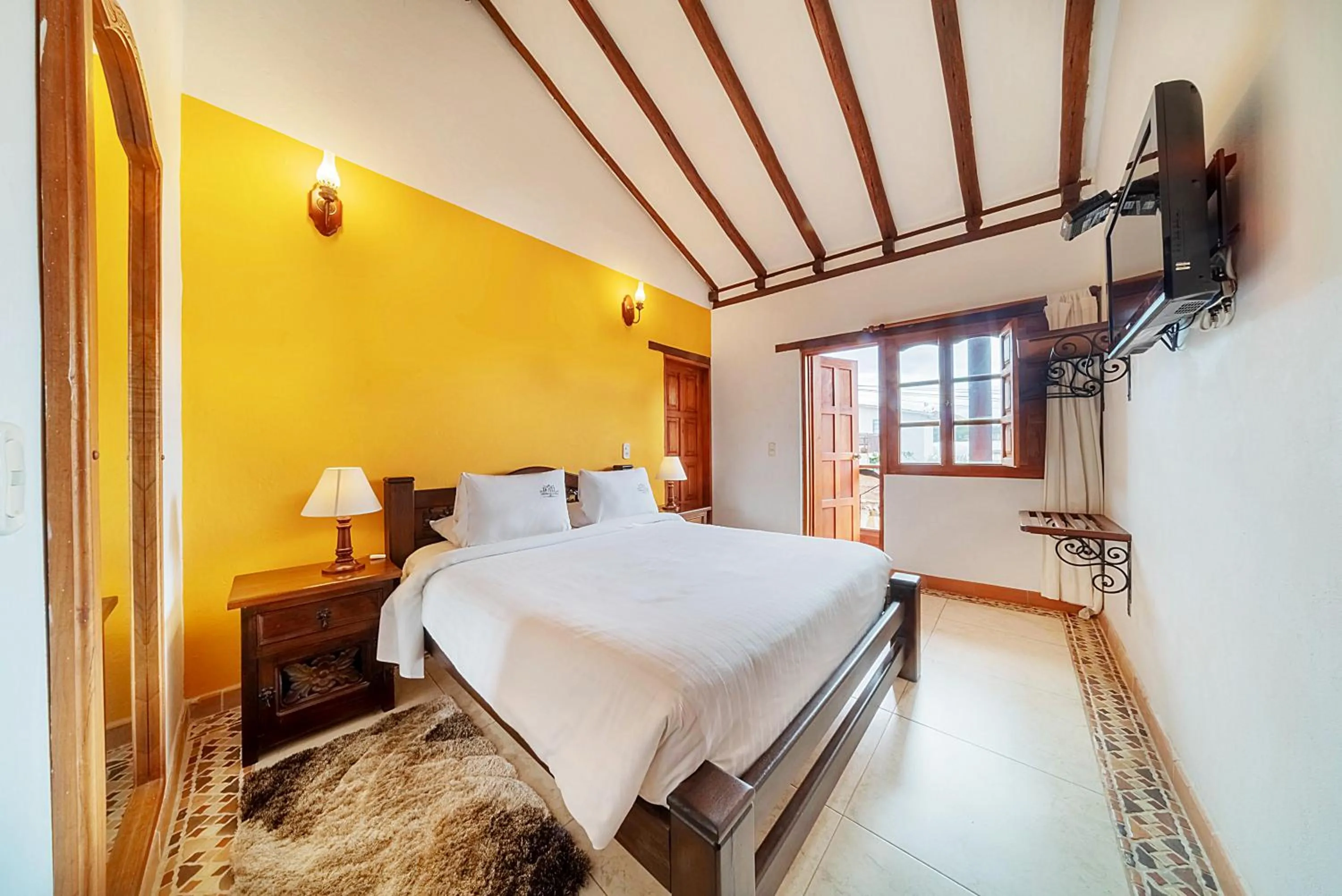 Bed in Hotel Jardines De La Villa