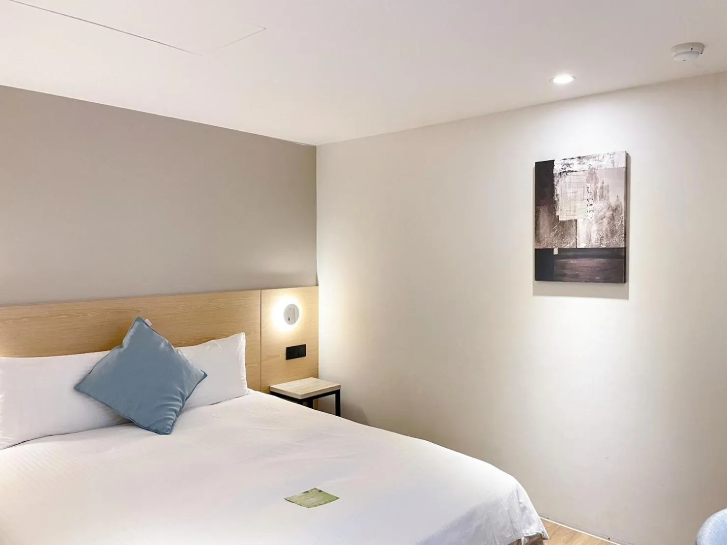 Bed in Hub Hotel Zhongli