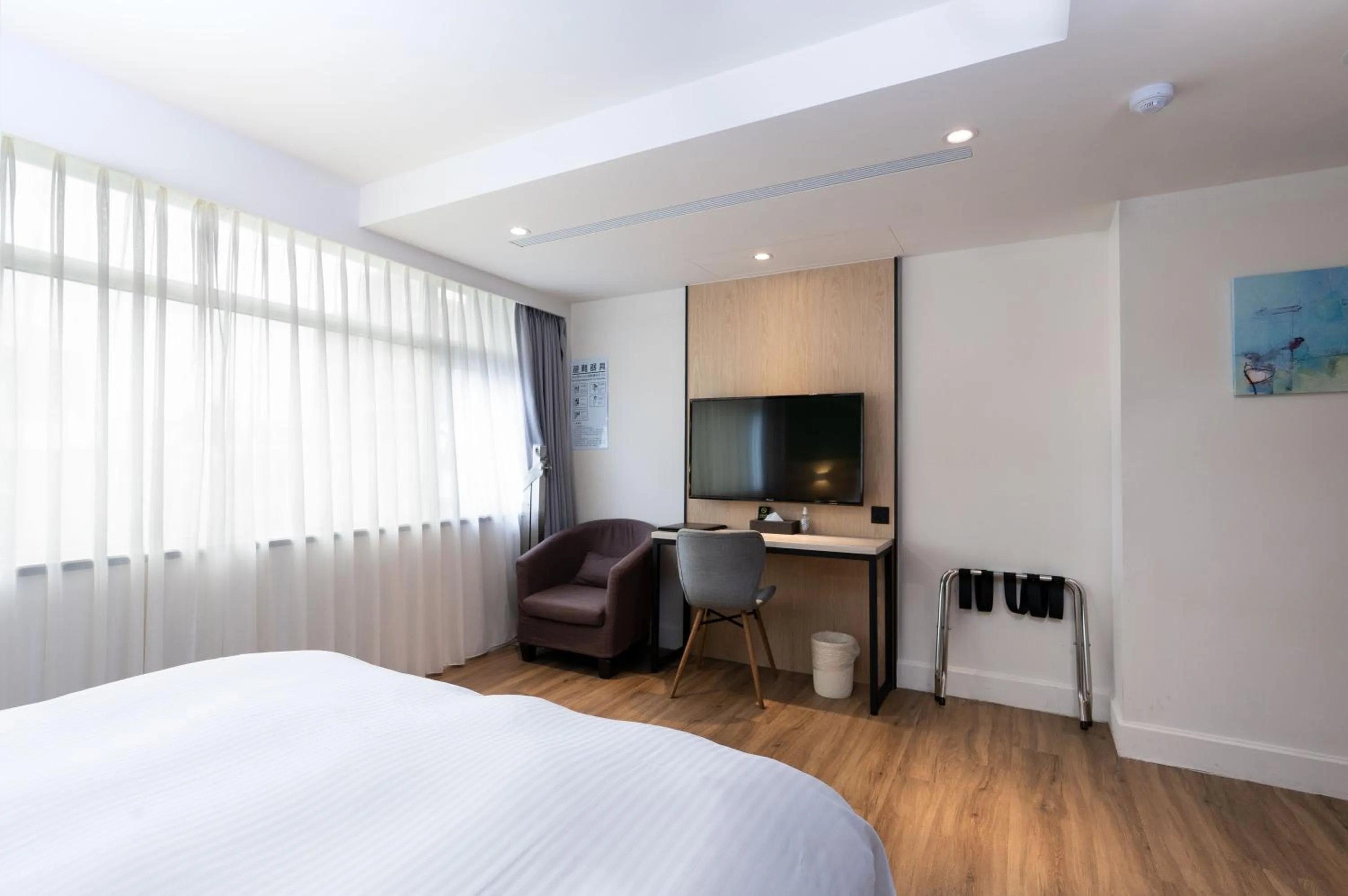 Bed in Hub Hotel Zhongli