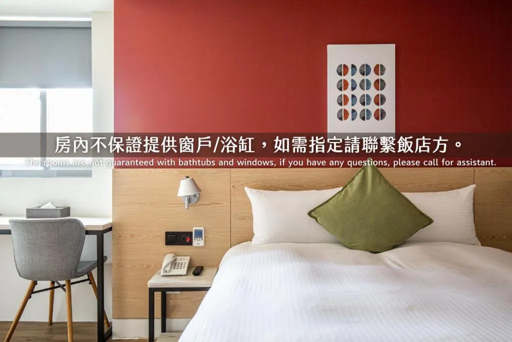 Bed in Hub Hotel Zhongli