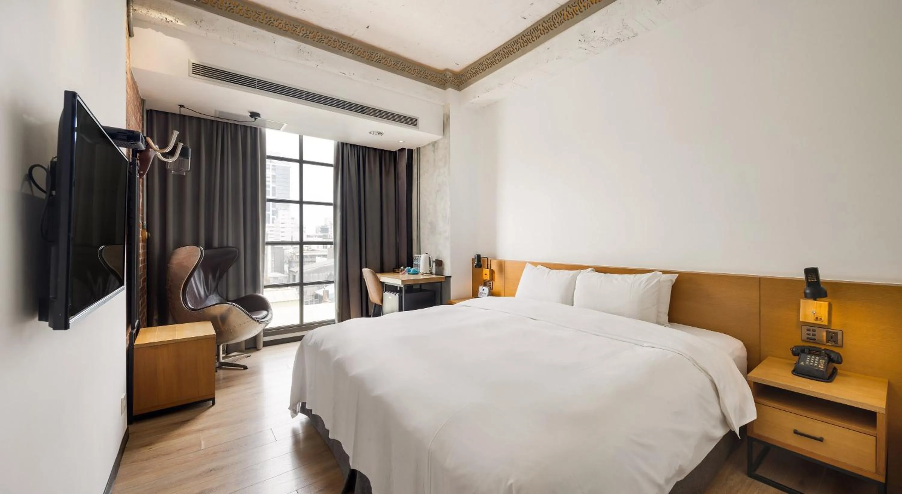 Bed in BlueSky Hotel