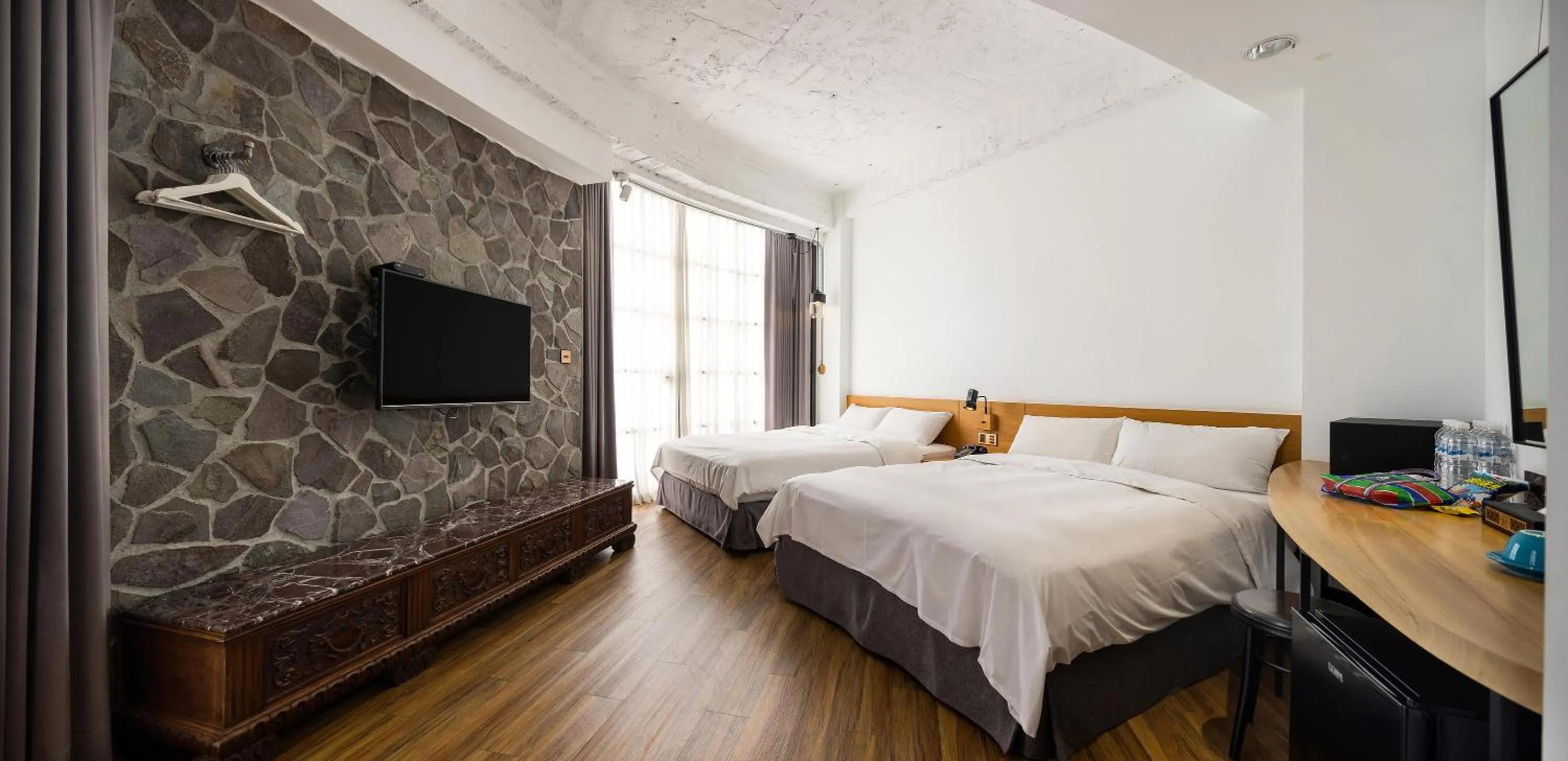 Bed in BlueSky Hotel