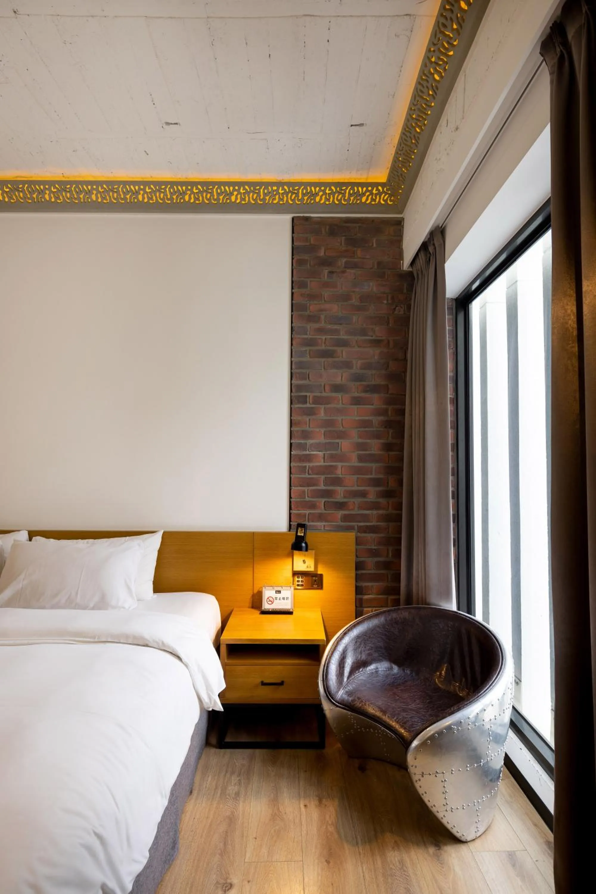 Bed in BlueSky Hotel