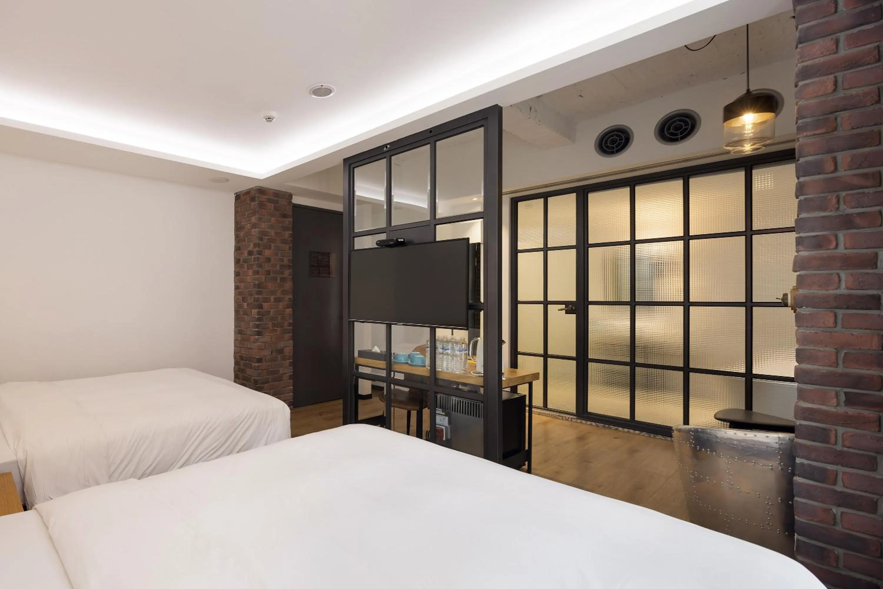 Bed in BlueSky Hotel