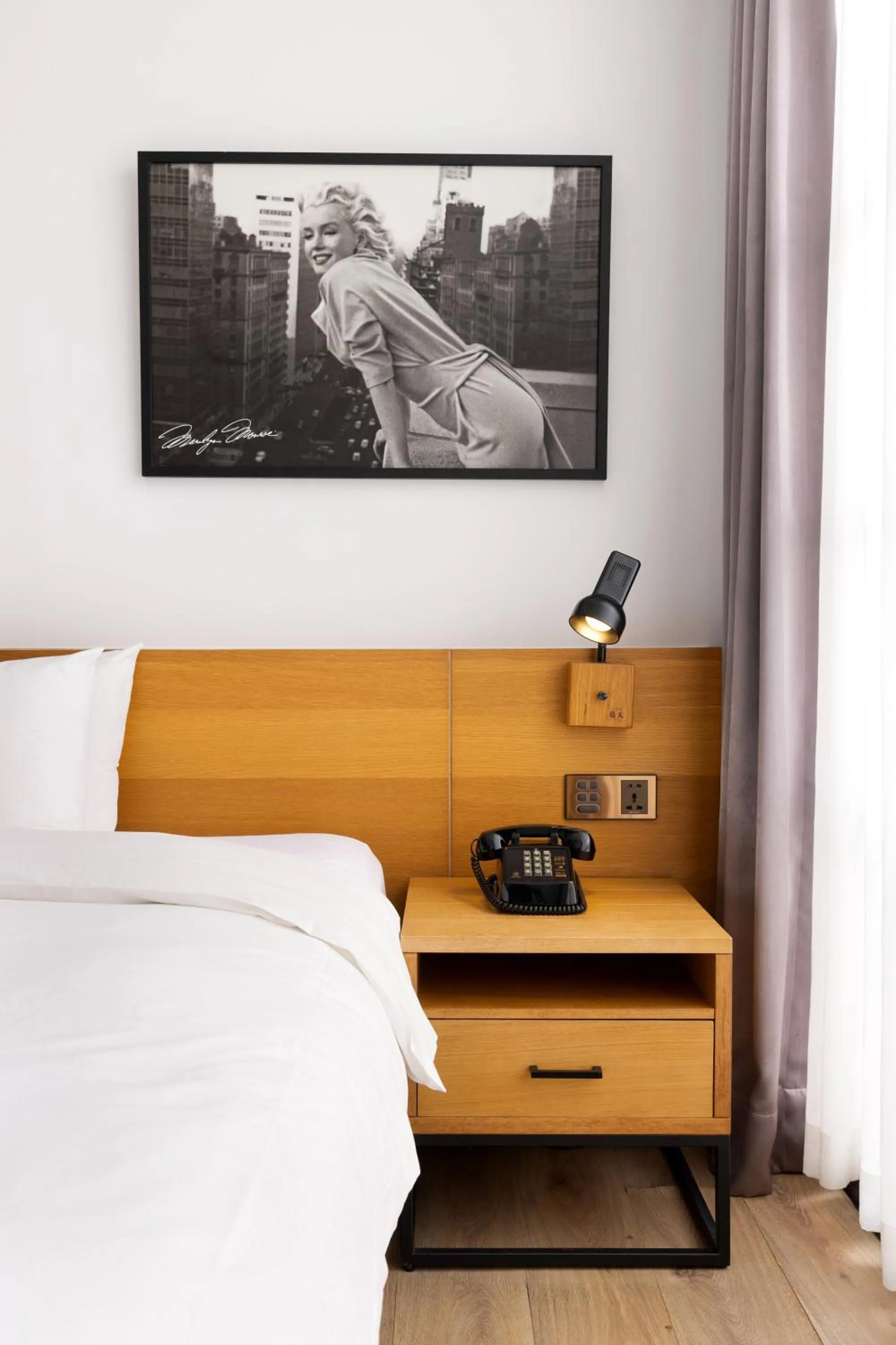 Bed in BlueSky Hotel