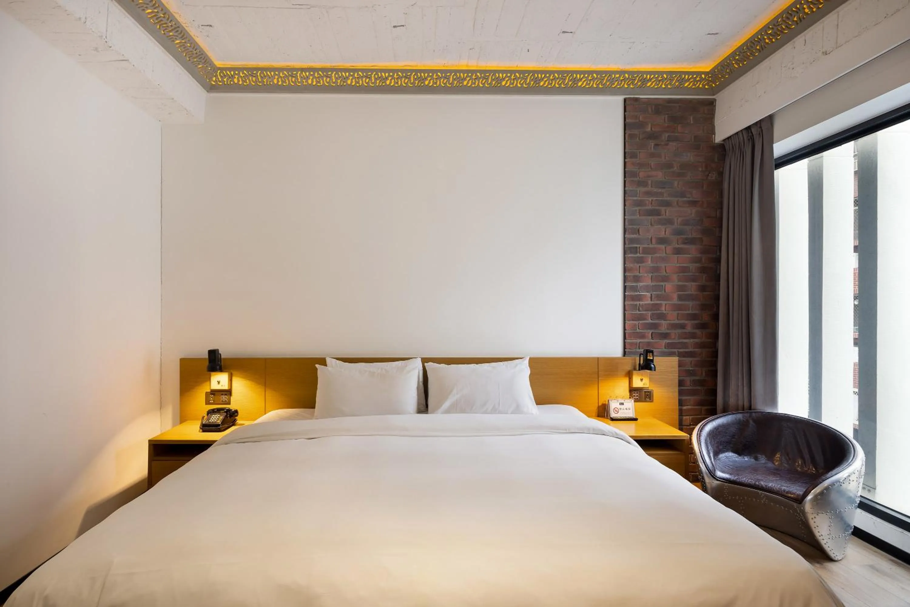 Bed in BlueSky Hotel