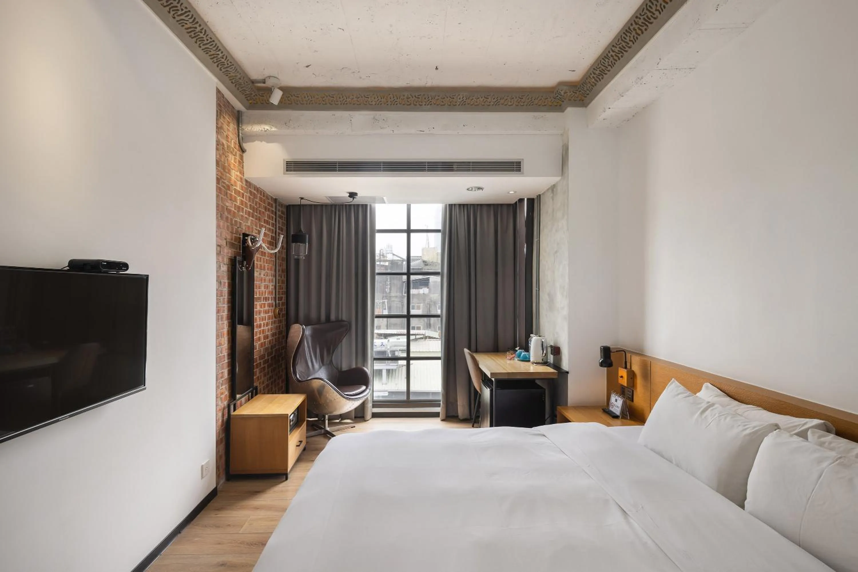 Bed in BlueSky Hotel