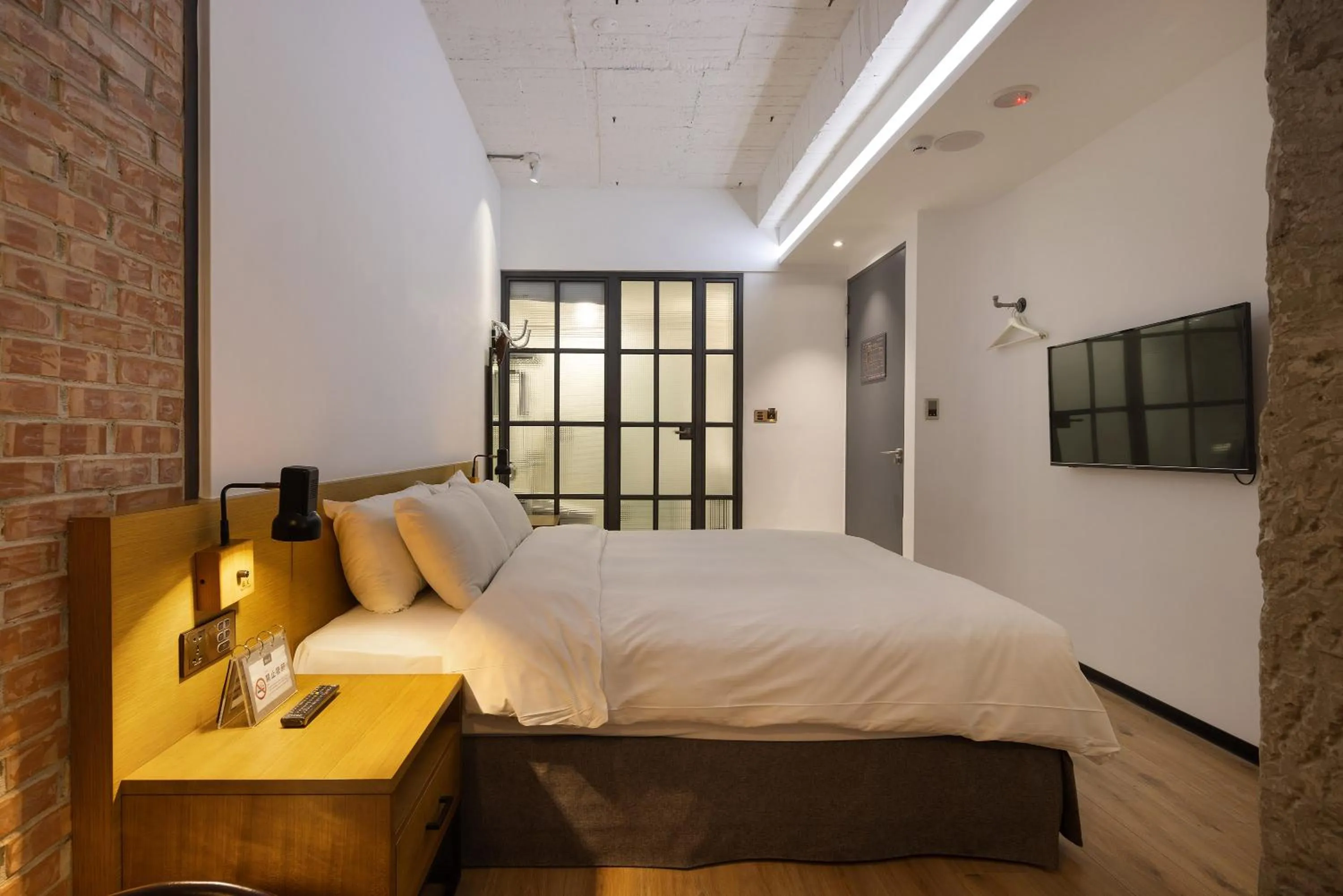 Bed in BlueSky Hotel