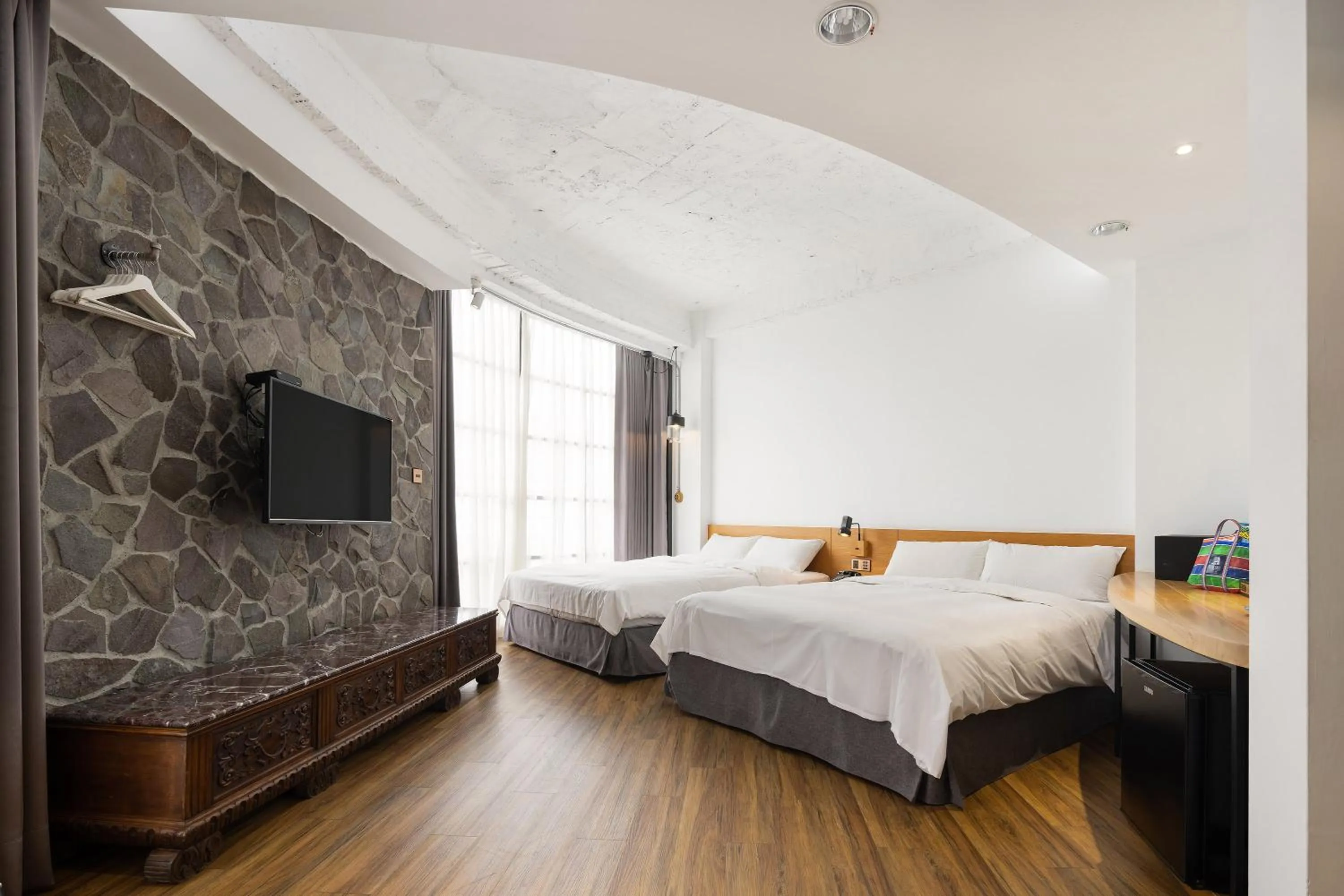 Bed in BlueSky Hotel