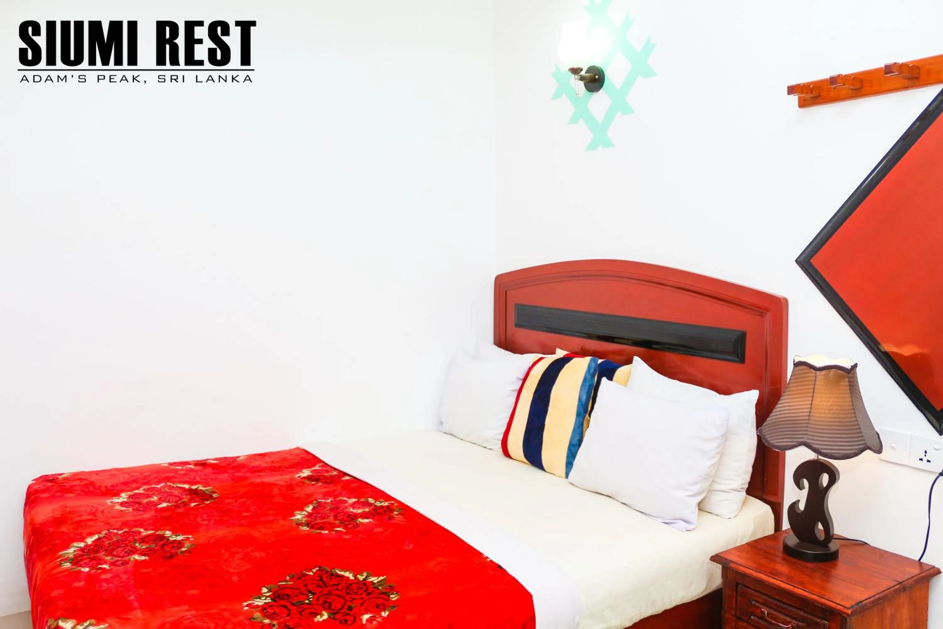 Seating area, Bed in Siumi Rest
