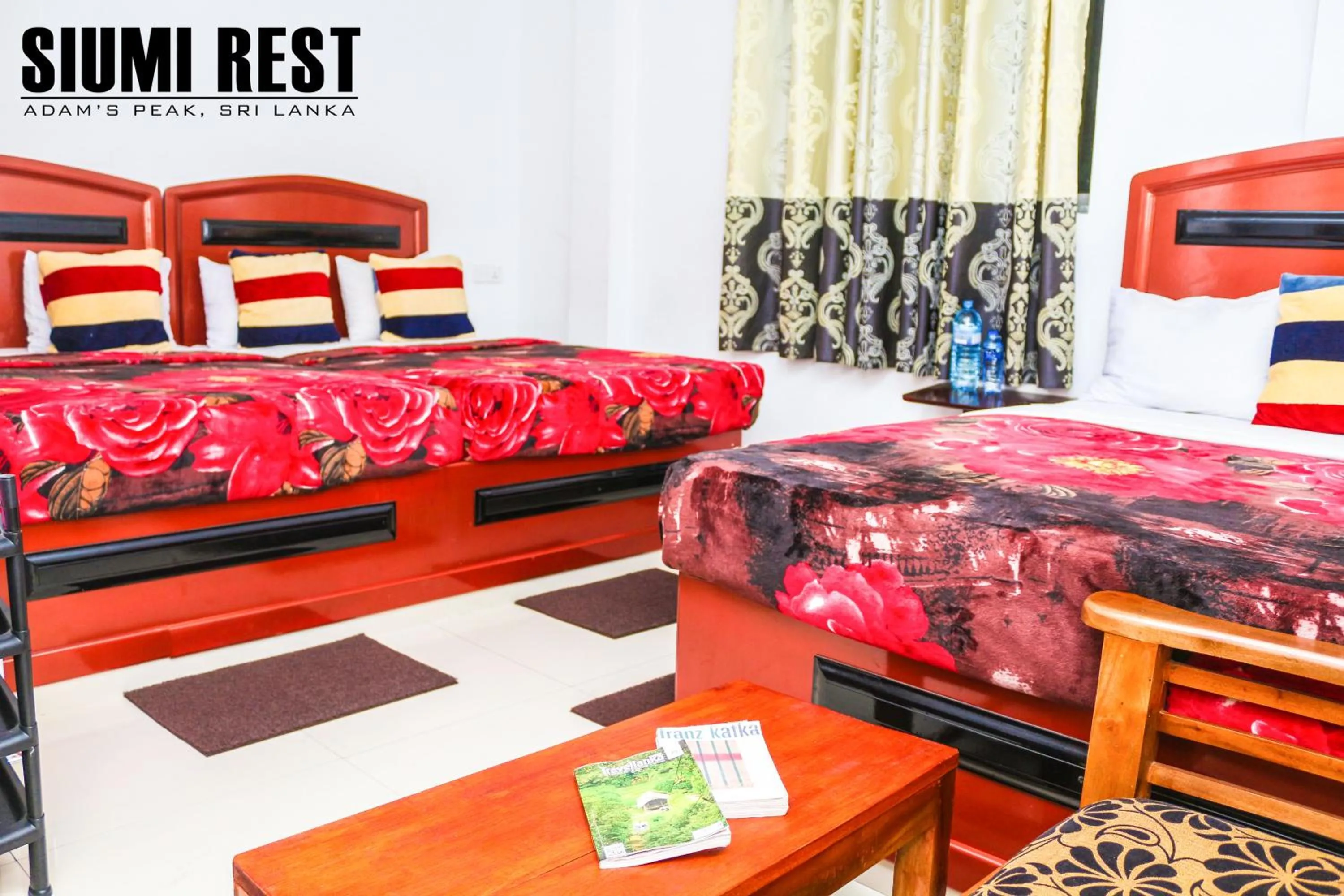 Seating area, Bed in Siumi Rest